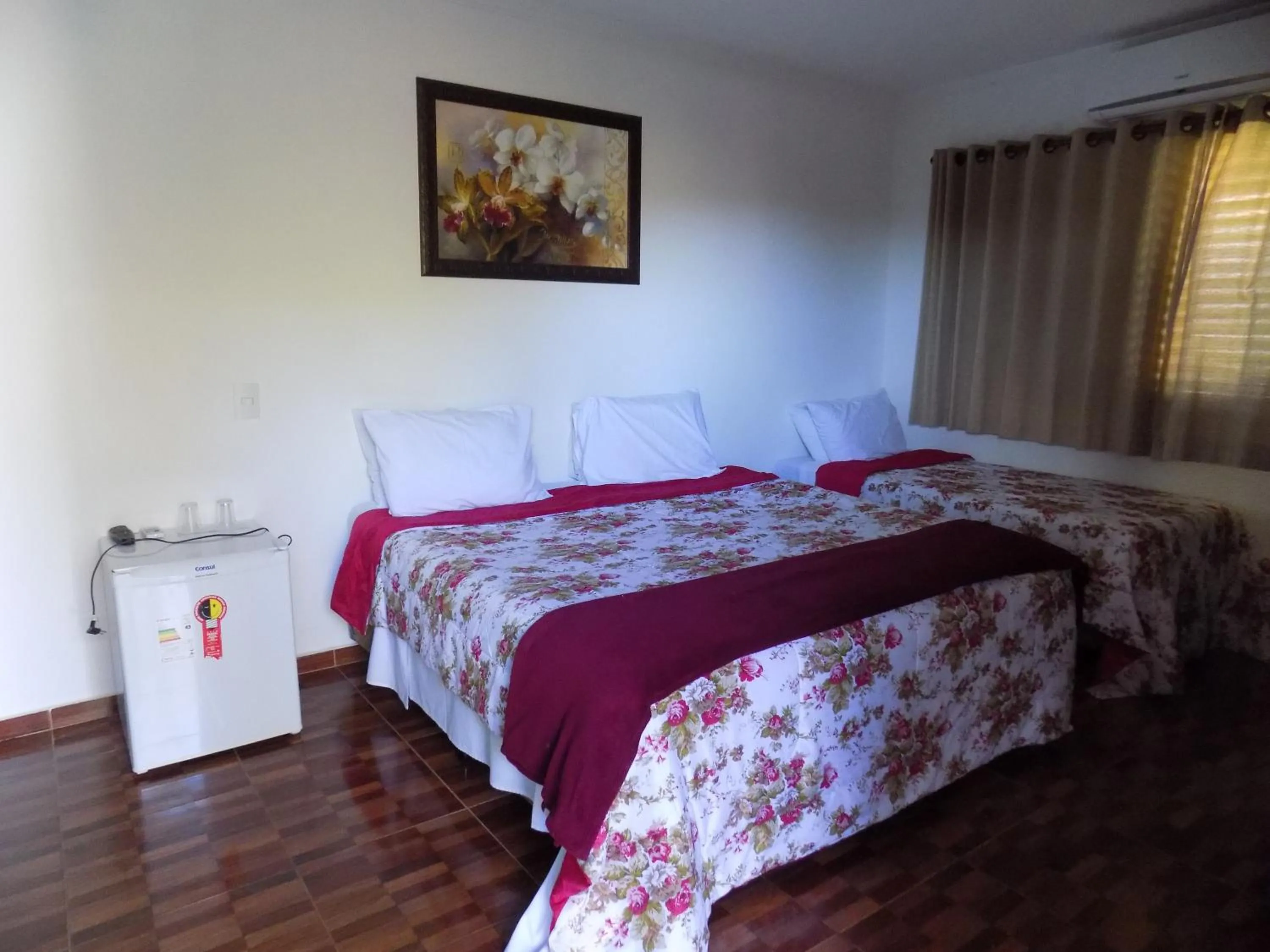 Photo of the whole room, Bed in Pousada Rural Paraíso