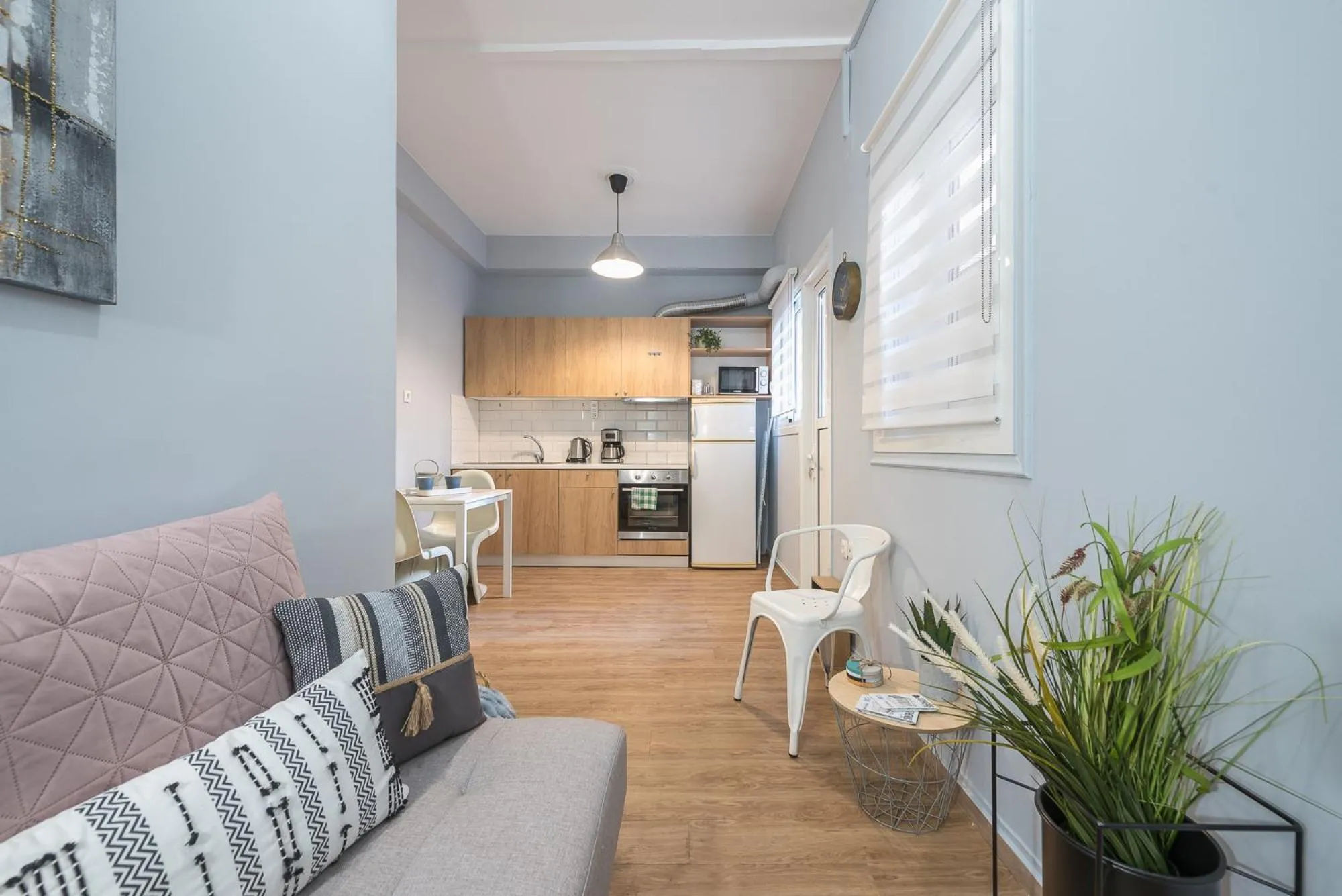 Living room in City Nest Apartment by Cloudkeys