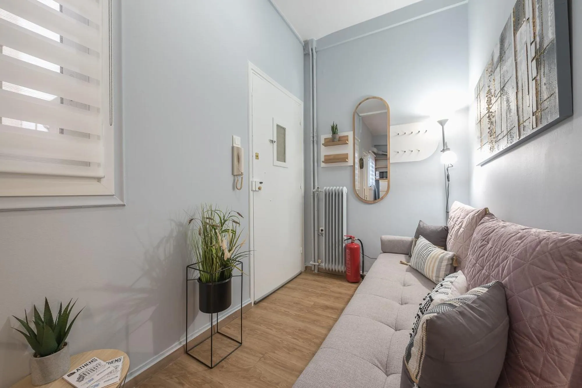 Living room in City Nest Apartment by Cloudkeys