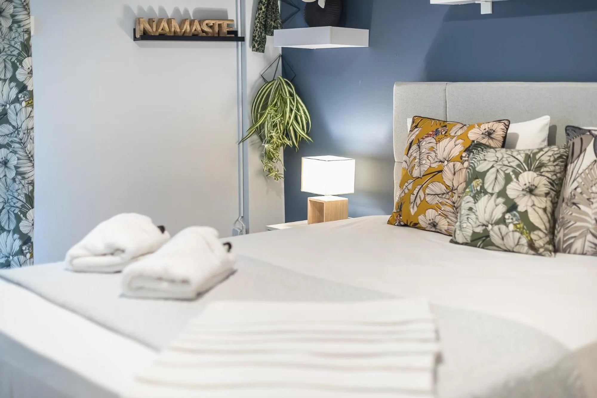 Bed in City Nest Apartment by Cloudkeys