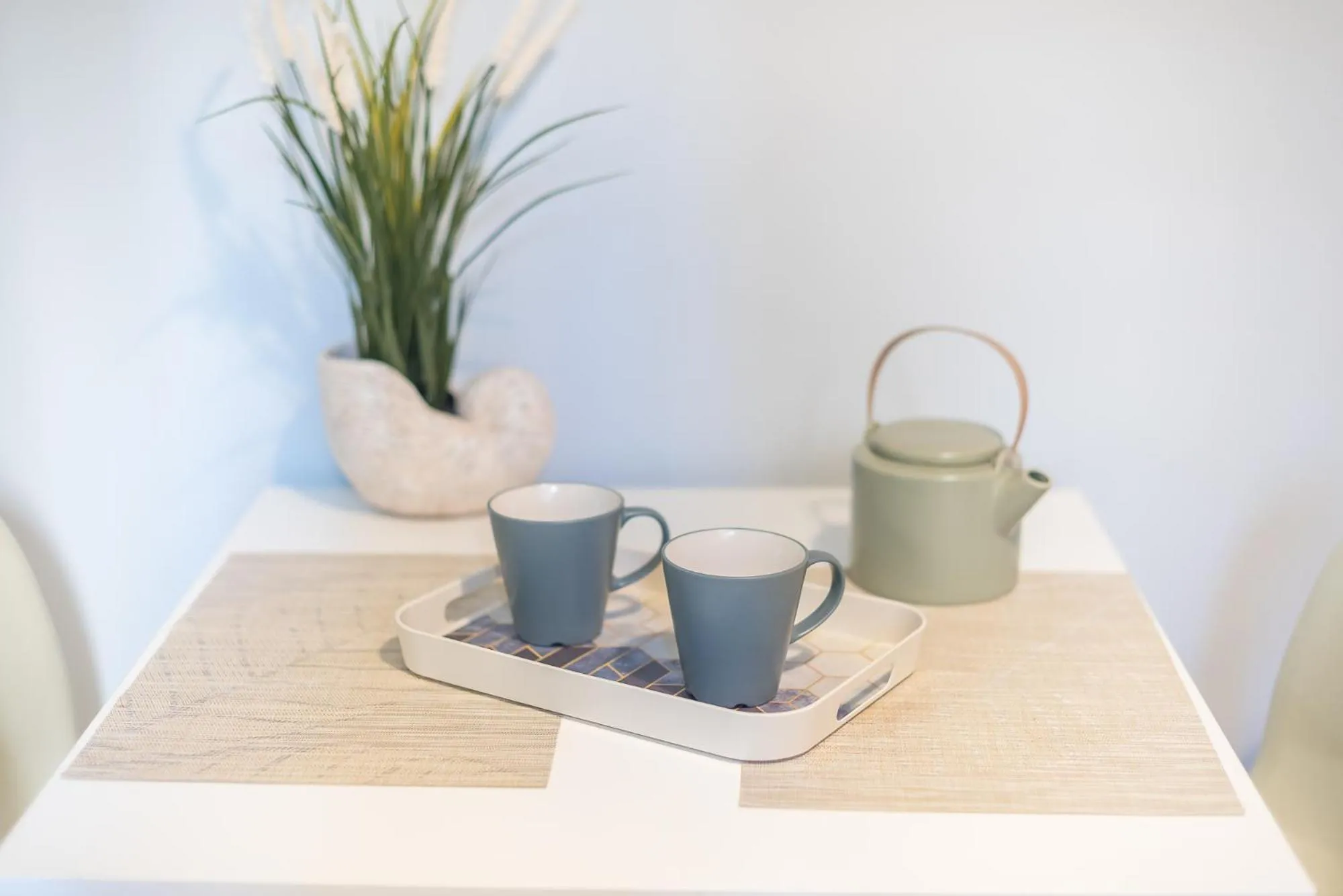 Coffee/tea facilities in City Nest Apartment by Cloudkeys