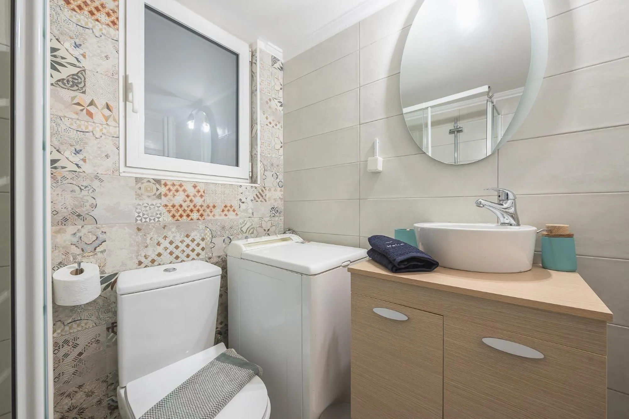 Bathroom in City Nest Apartment by Cloudkeys