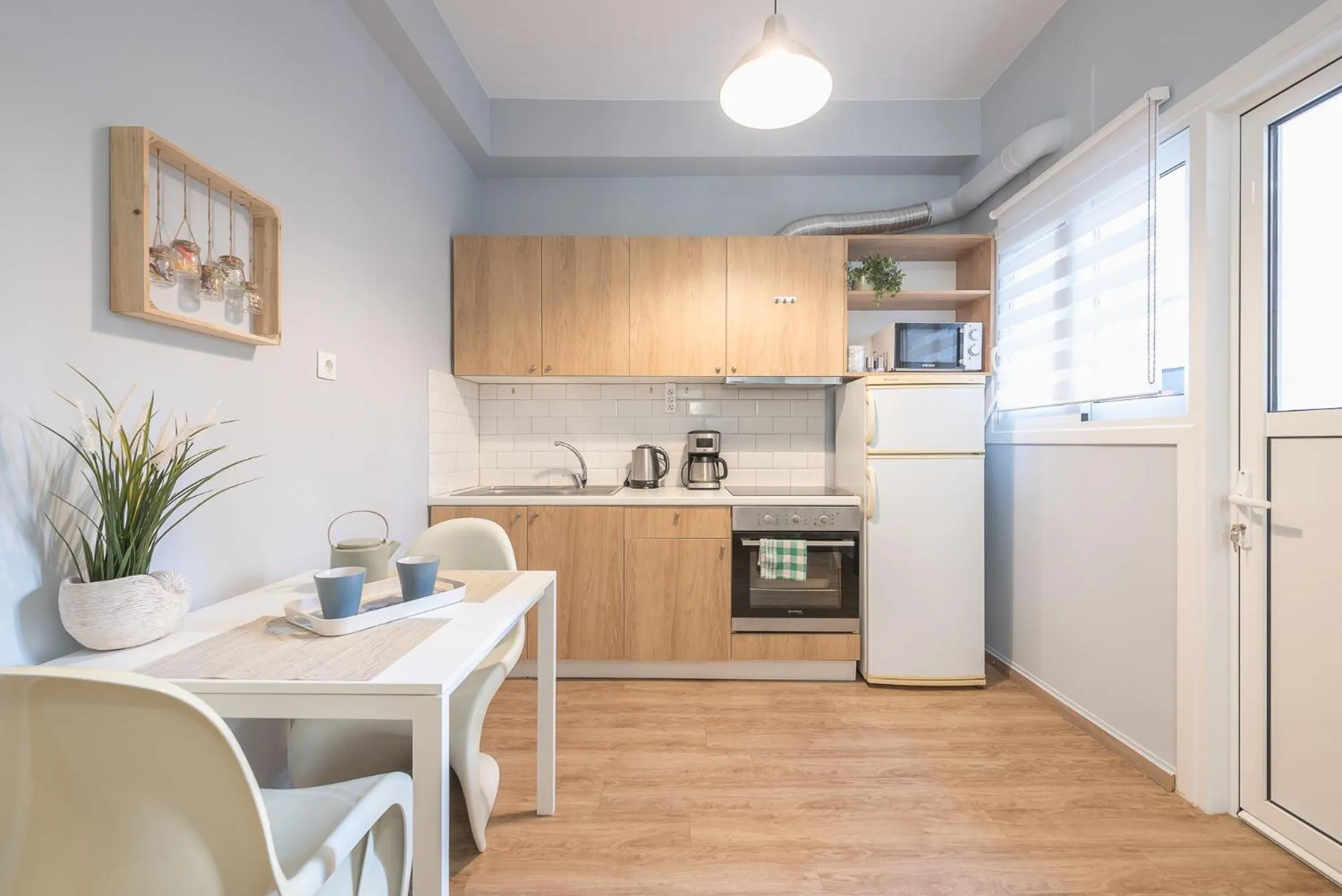 Coffee/tea facilities in City Nest Apartment by Cloudkeys