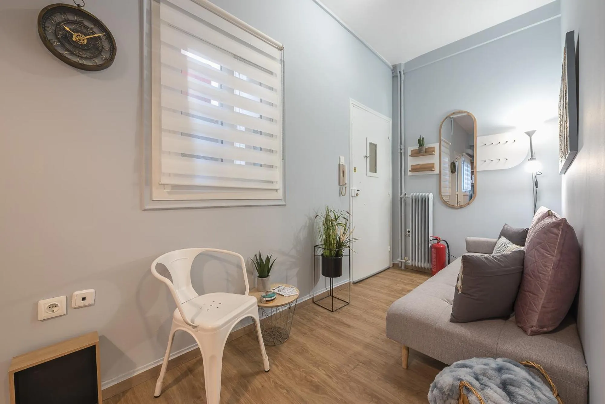 Living room in City Nest Apartment by Cloudkeys