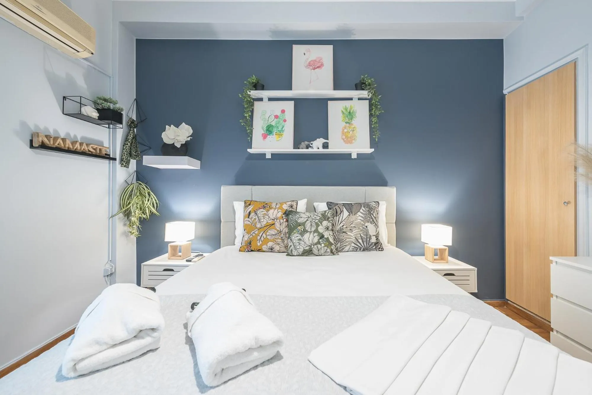 Bed in City Nest Apartment by Cloudkeys