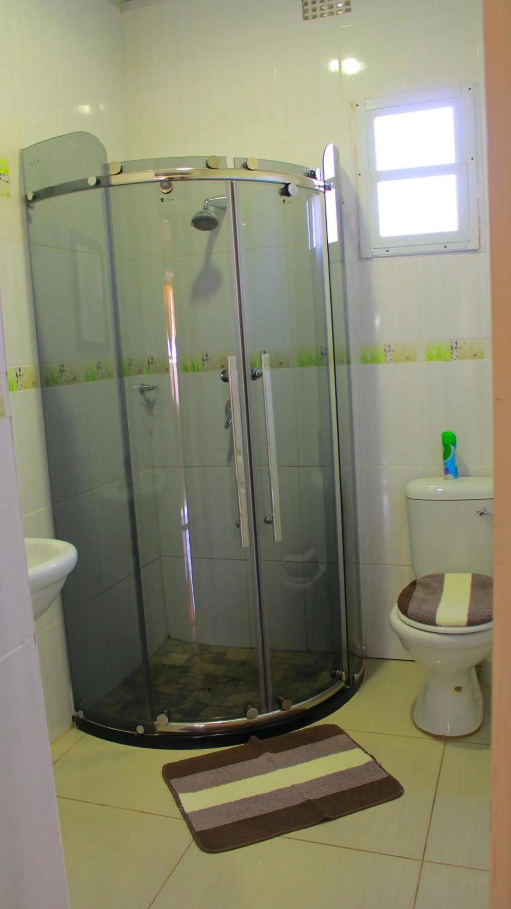 Toilet in Asante Apartments