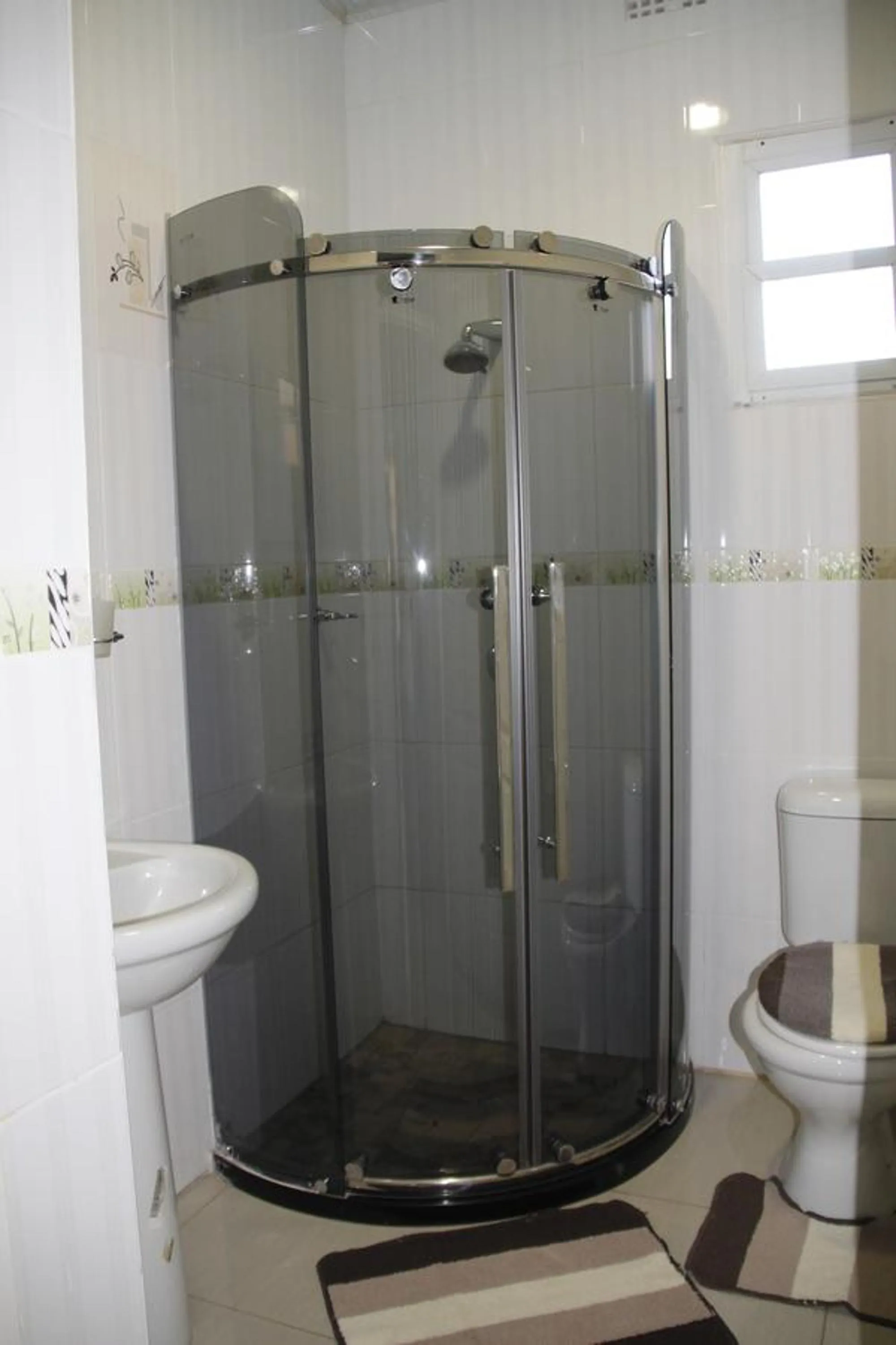 Shower in Asante Apartments