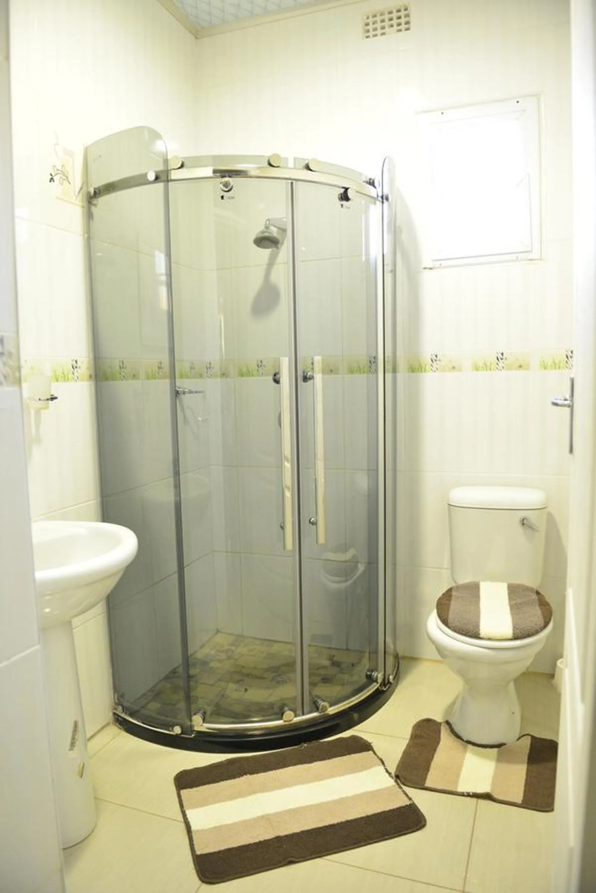 Shower in Asante Apartments