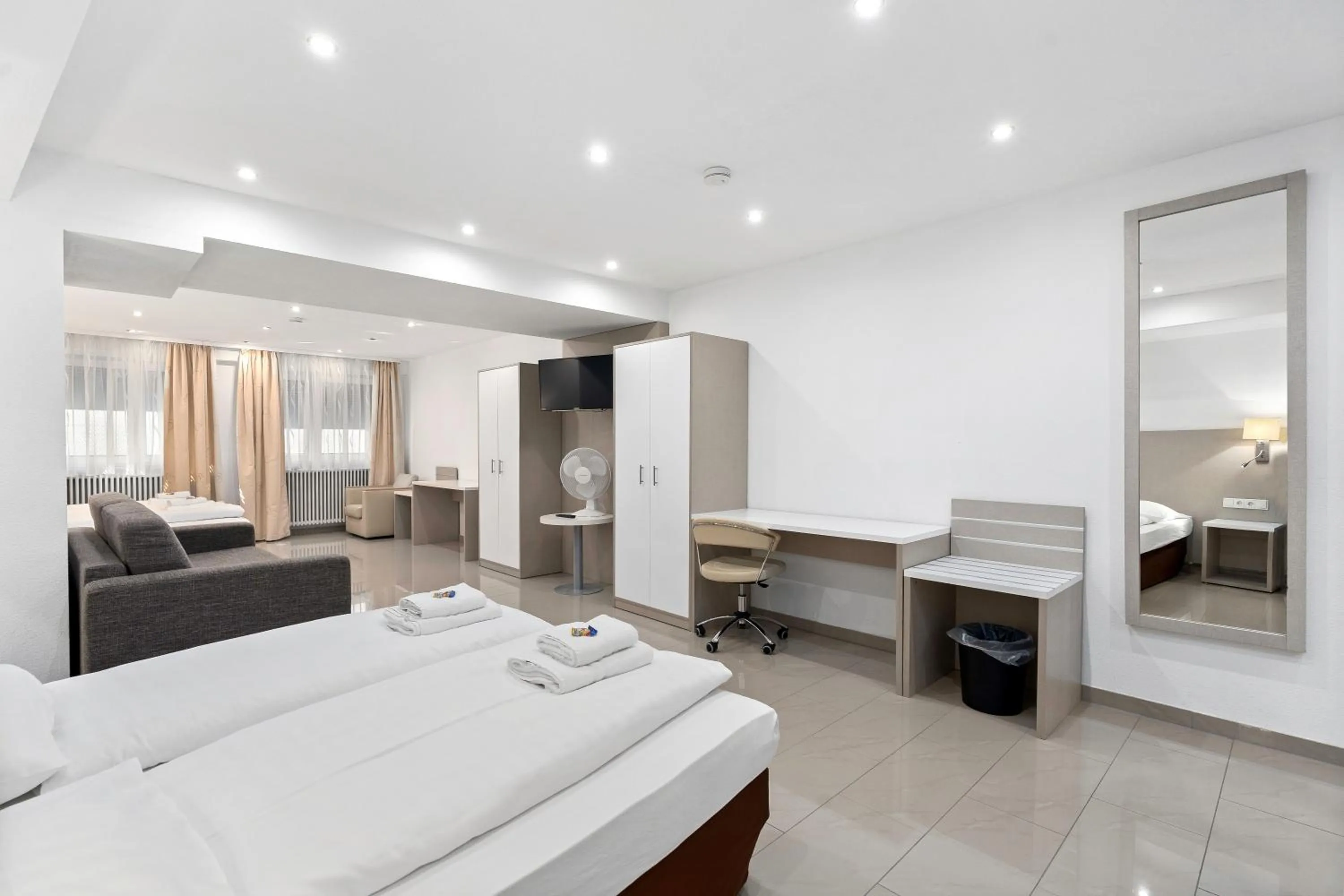 Seating area, Bed in Hotel Adler