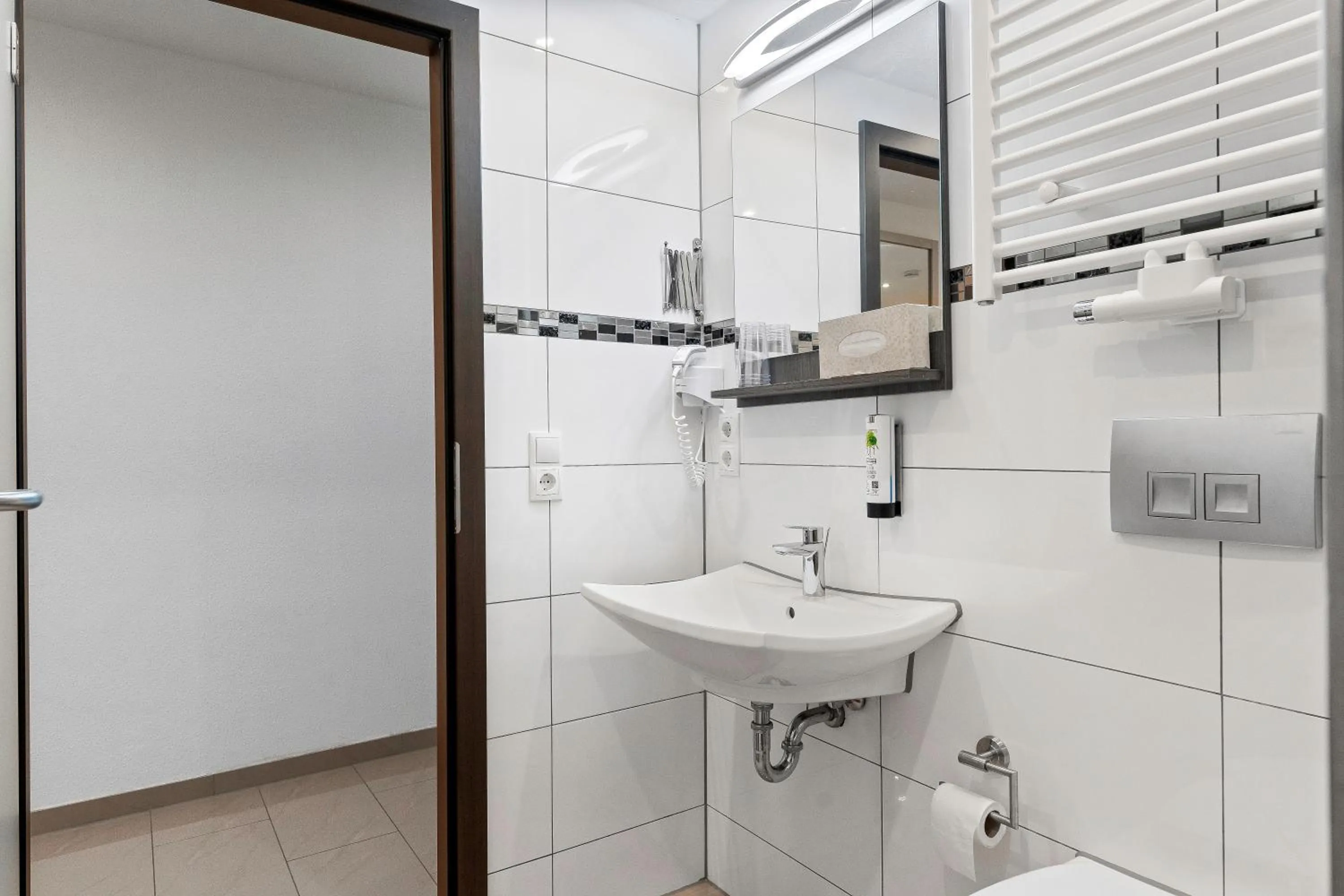 Bathroom in Hotel Adler