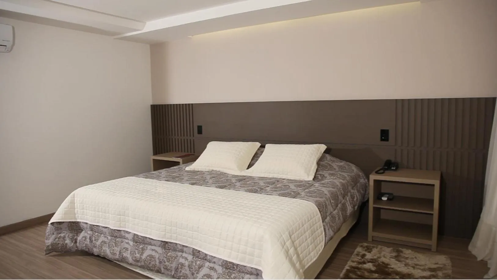 Bed in Mogano Premium Hotel - ELETROPOSTO