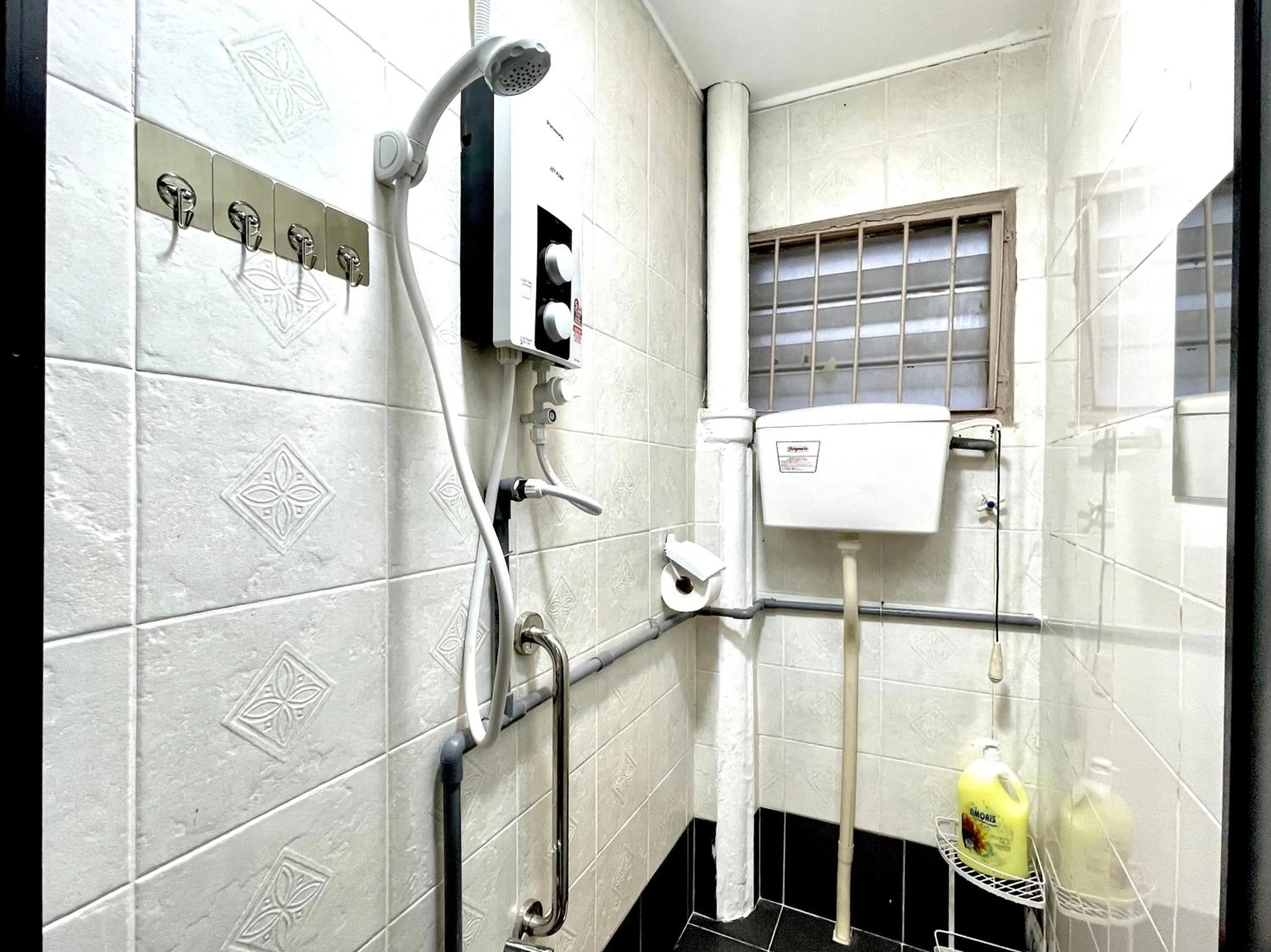 Bathroom in Hotel O S Homestay Premium