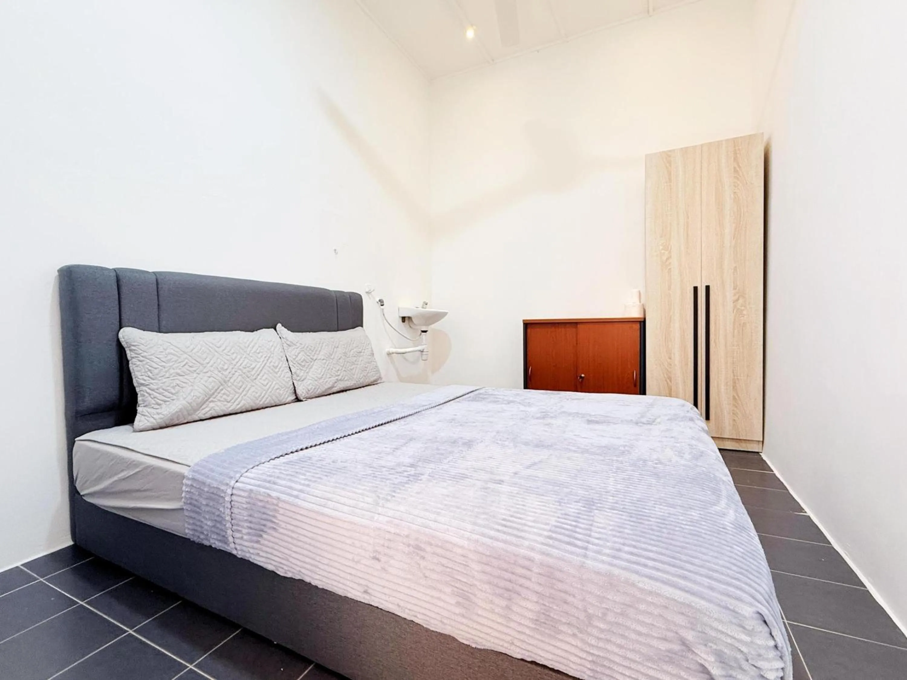 Bedroom, Bed in Hotel O S Homestay Premium