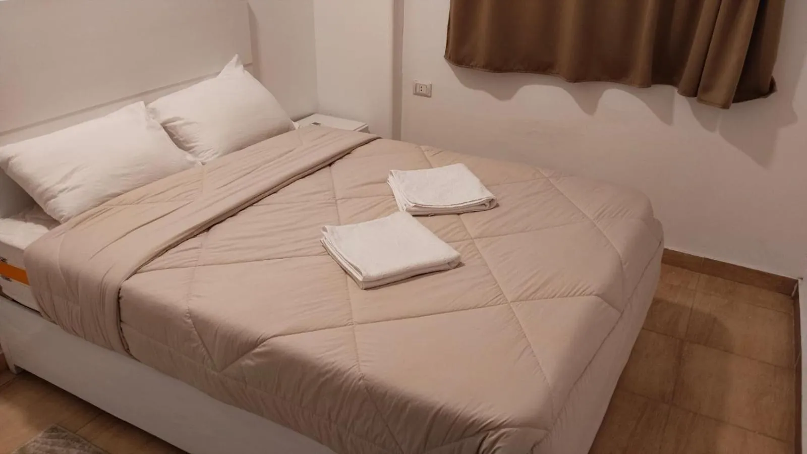 Bed in Sharqotel Luxor