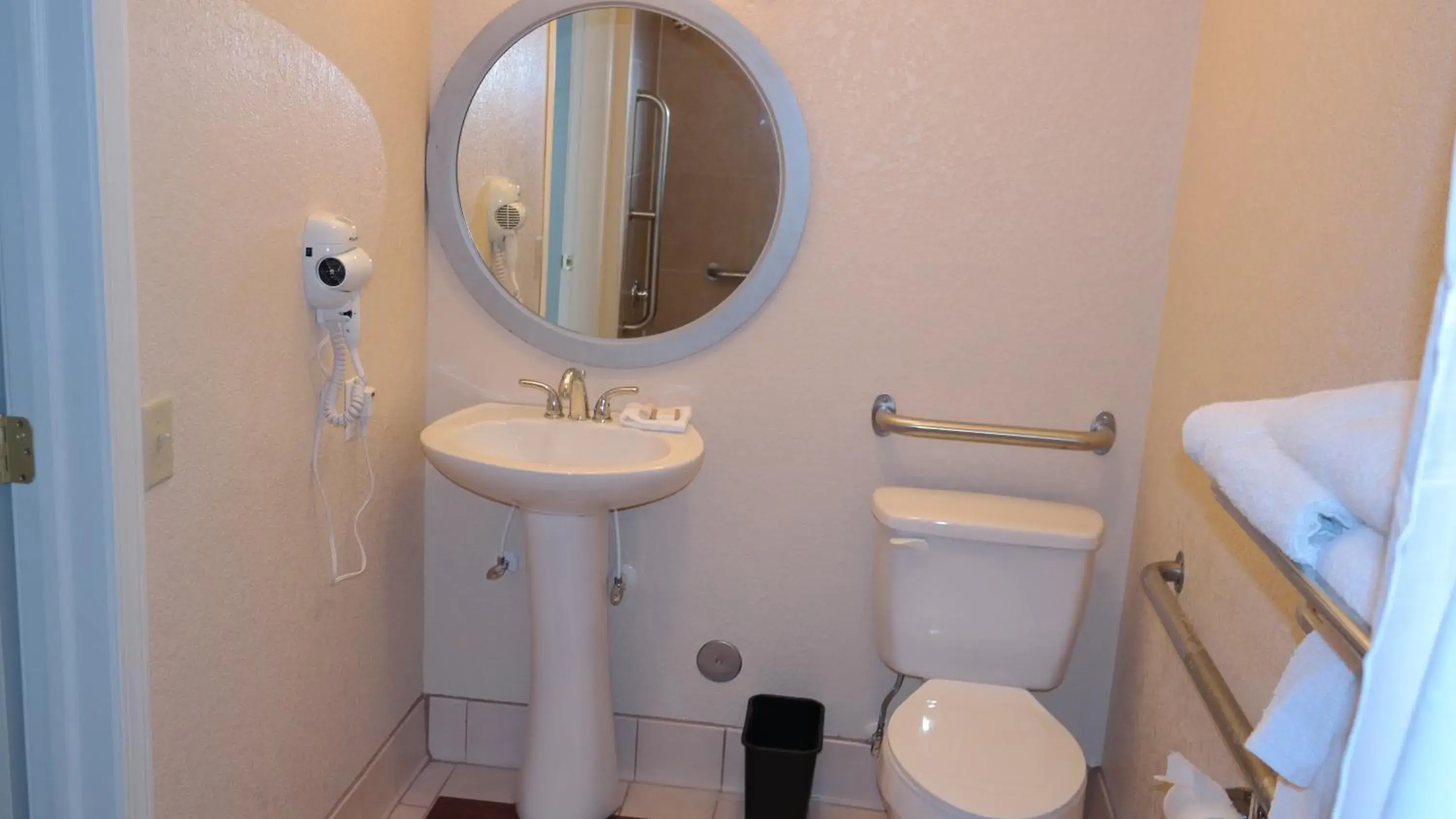 Bathroom in Baymont by Wyndham Stevens Point Bathroom in Baymont by Wyndham Stevens Point