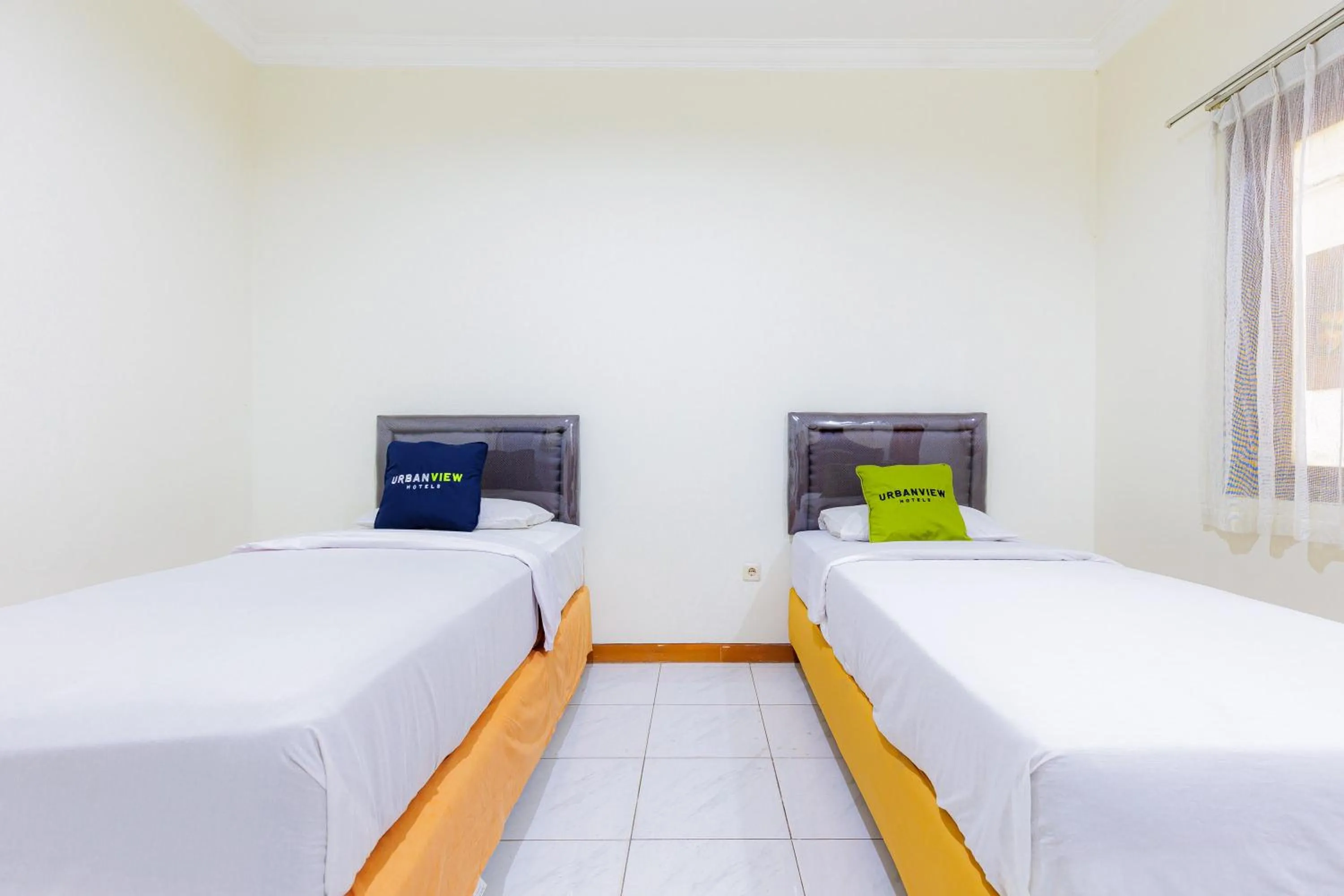 Bedroom, Bed in Urbanview Hotel Mitra near Grand Indonesia
