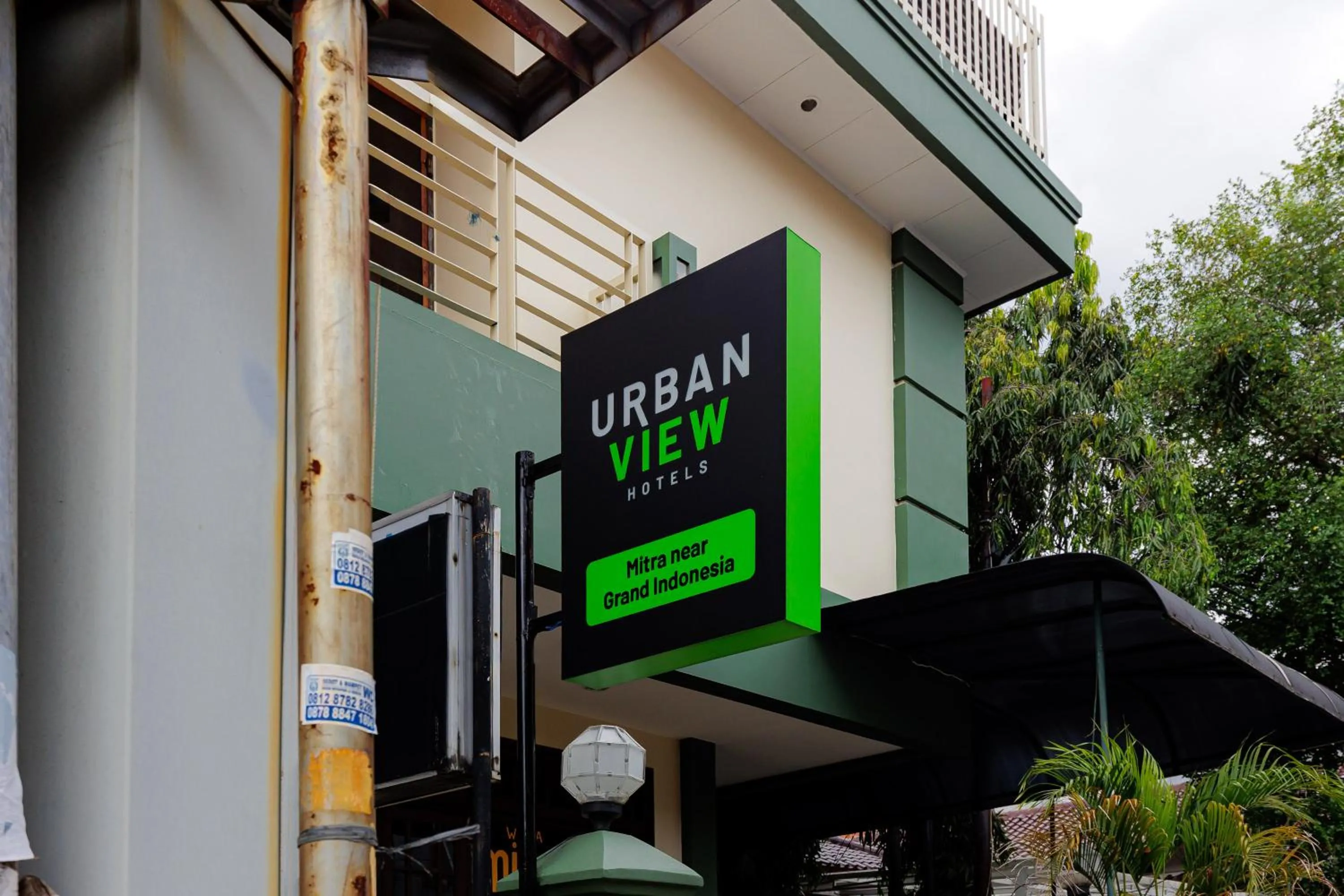 Property logo or sign in Urbanview Hotel Mitra near Grand Indonesia