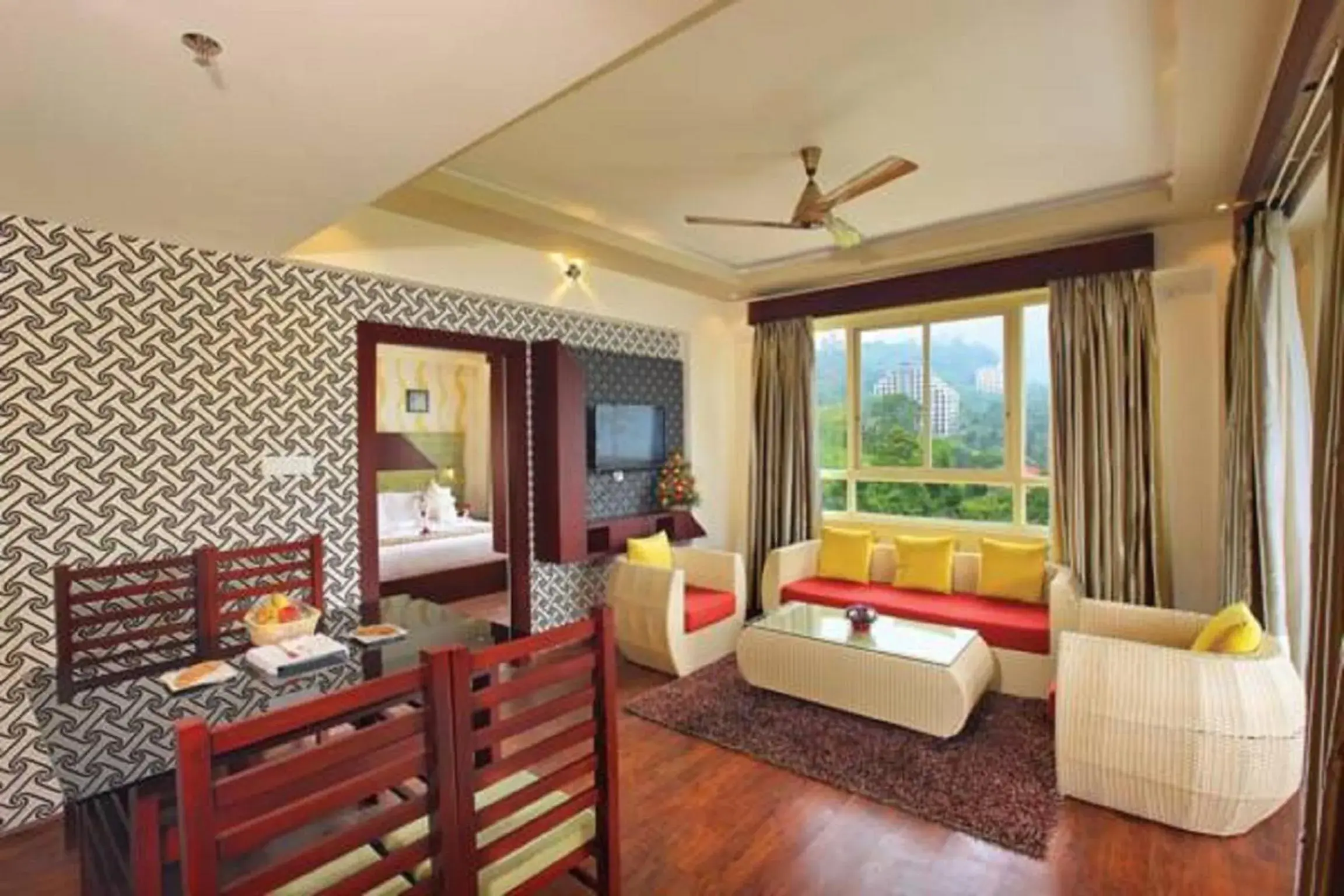 TV and multimedia, Bed in Gokulam Park Munnar TV and multimedia, Bed in Gokulam Park Munnar