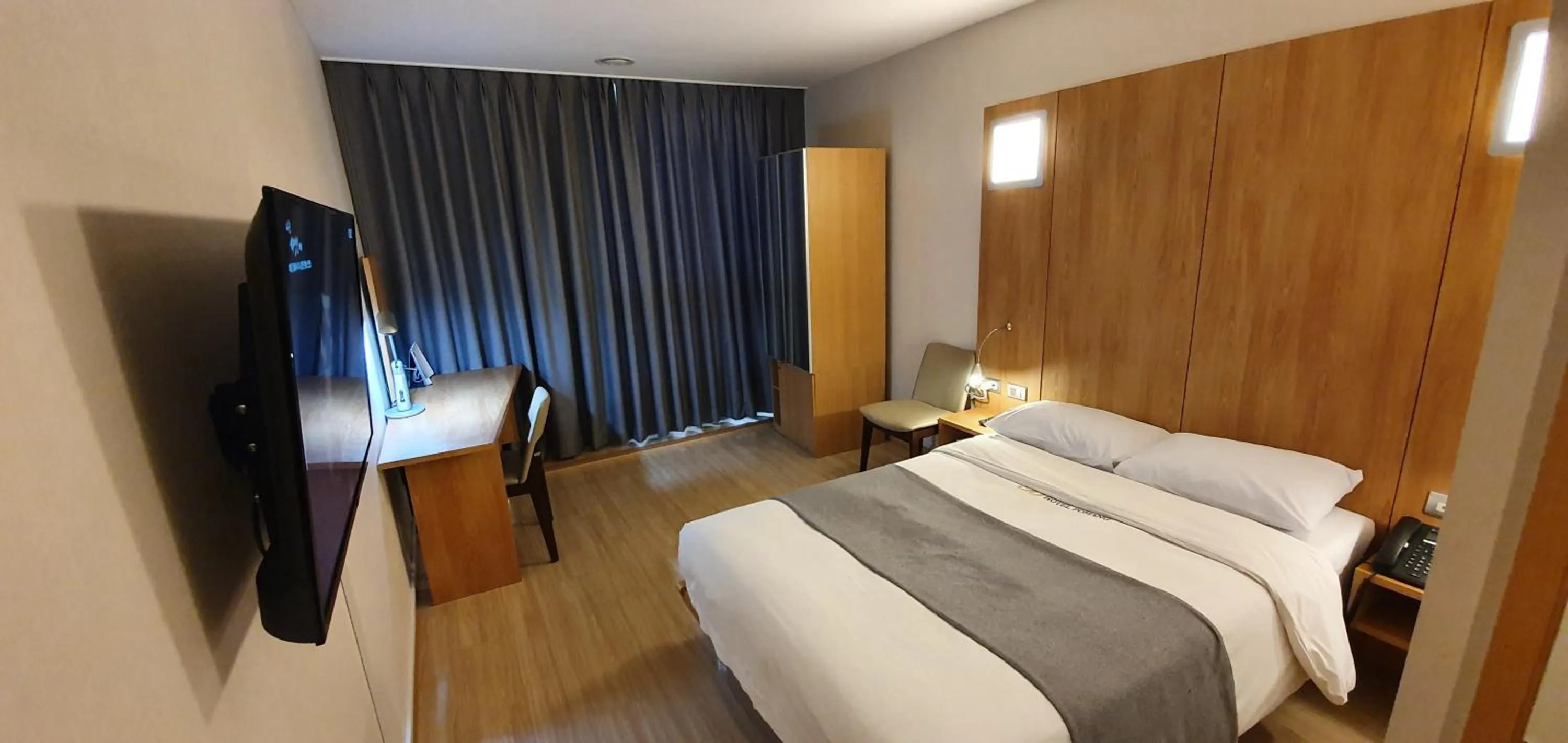 Bed in Benikea Hotel Pohang