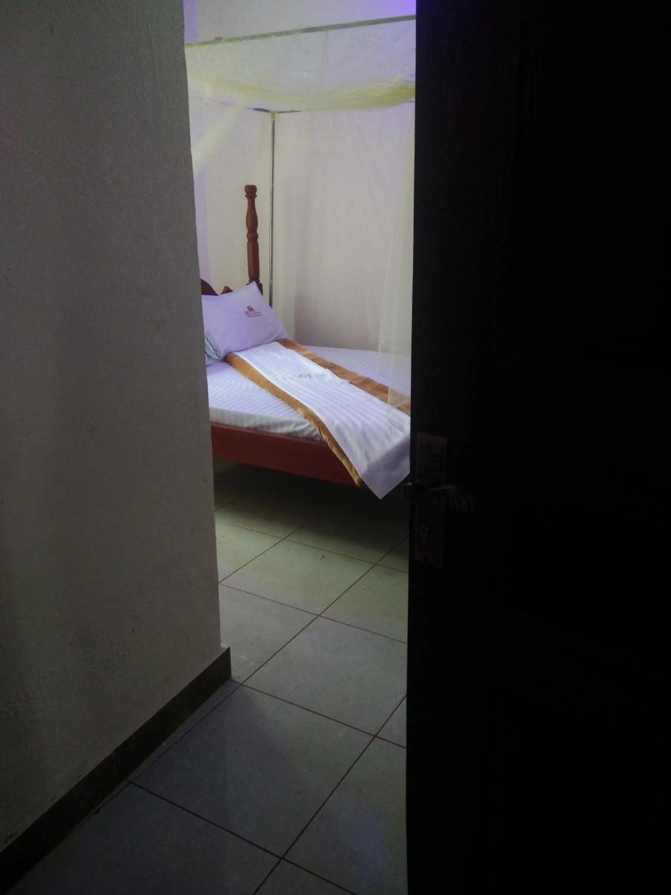 Bed in Heritage GuestHouse Kapchorwa