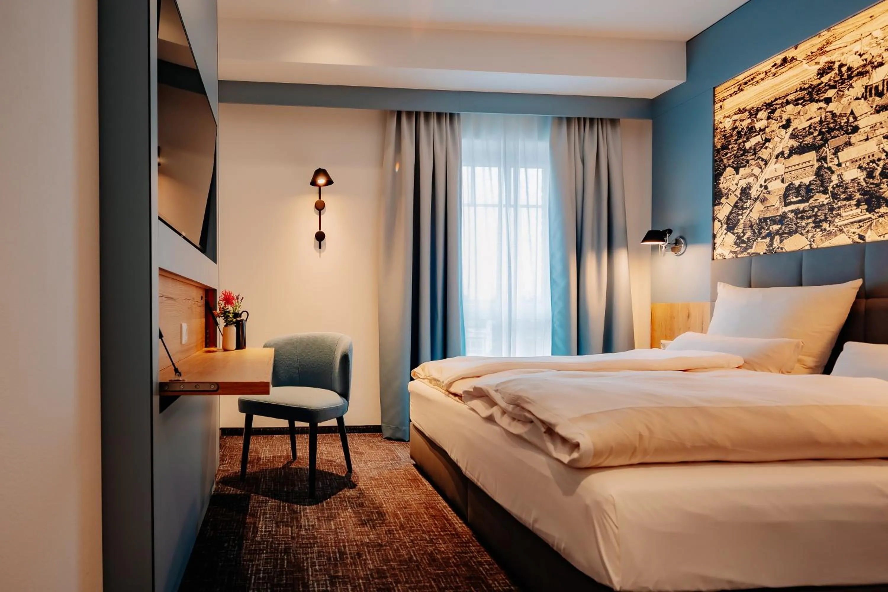 Photo of the whole room, Bed in Stadthöfe Rhede by Hackmann