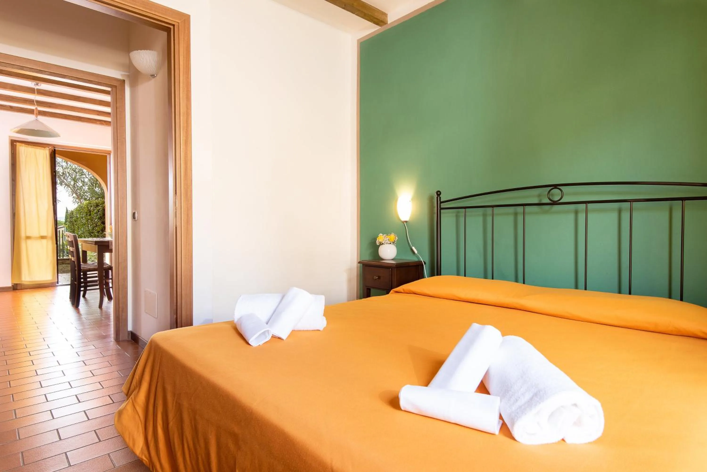 Photo of the whole room, Bed in Le Corti Di Montepitti