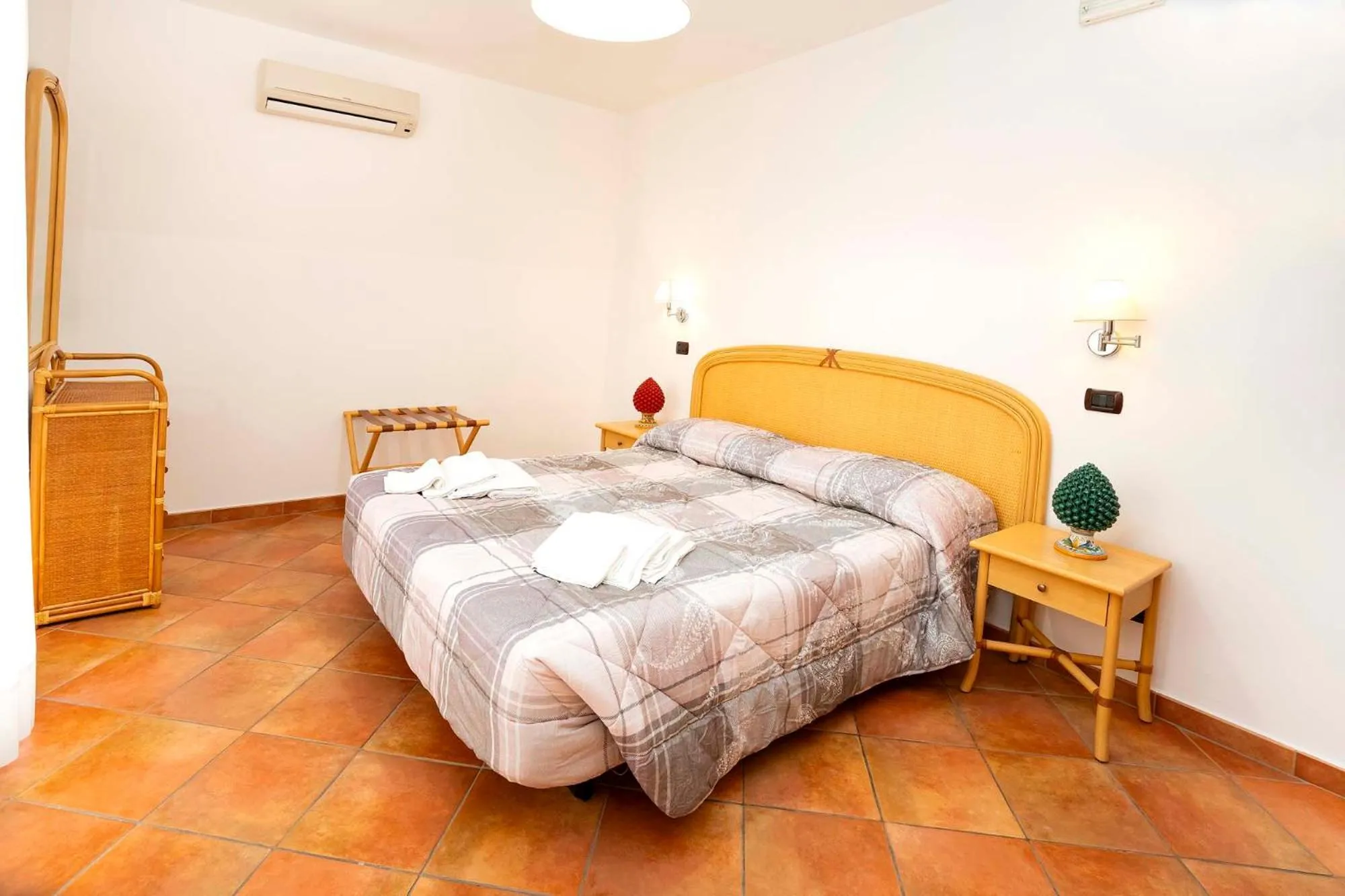 Bed in Le Tartarughe Aparthotel