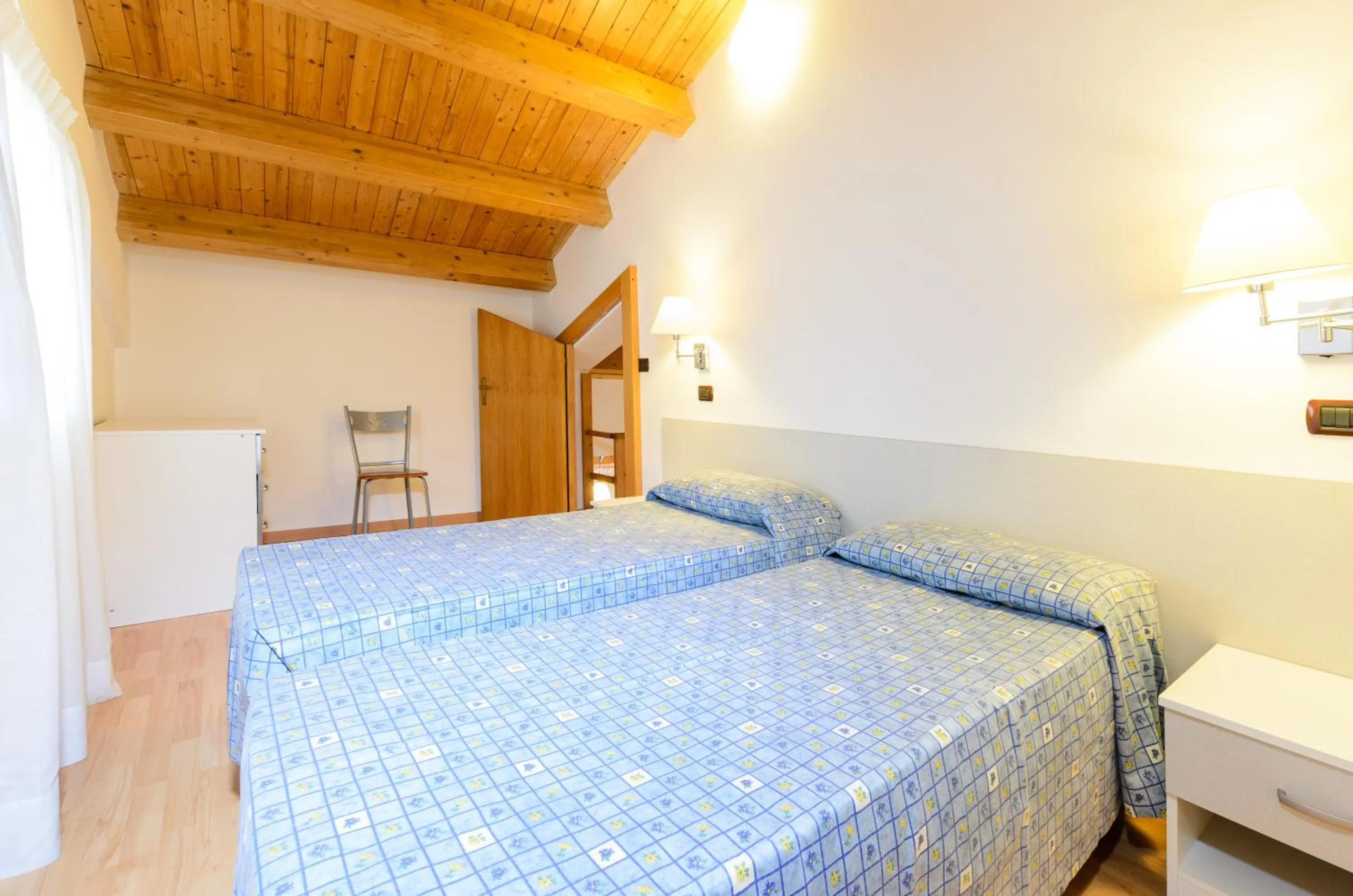 Bed in Le Tartarughe Aparthotel