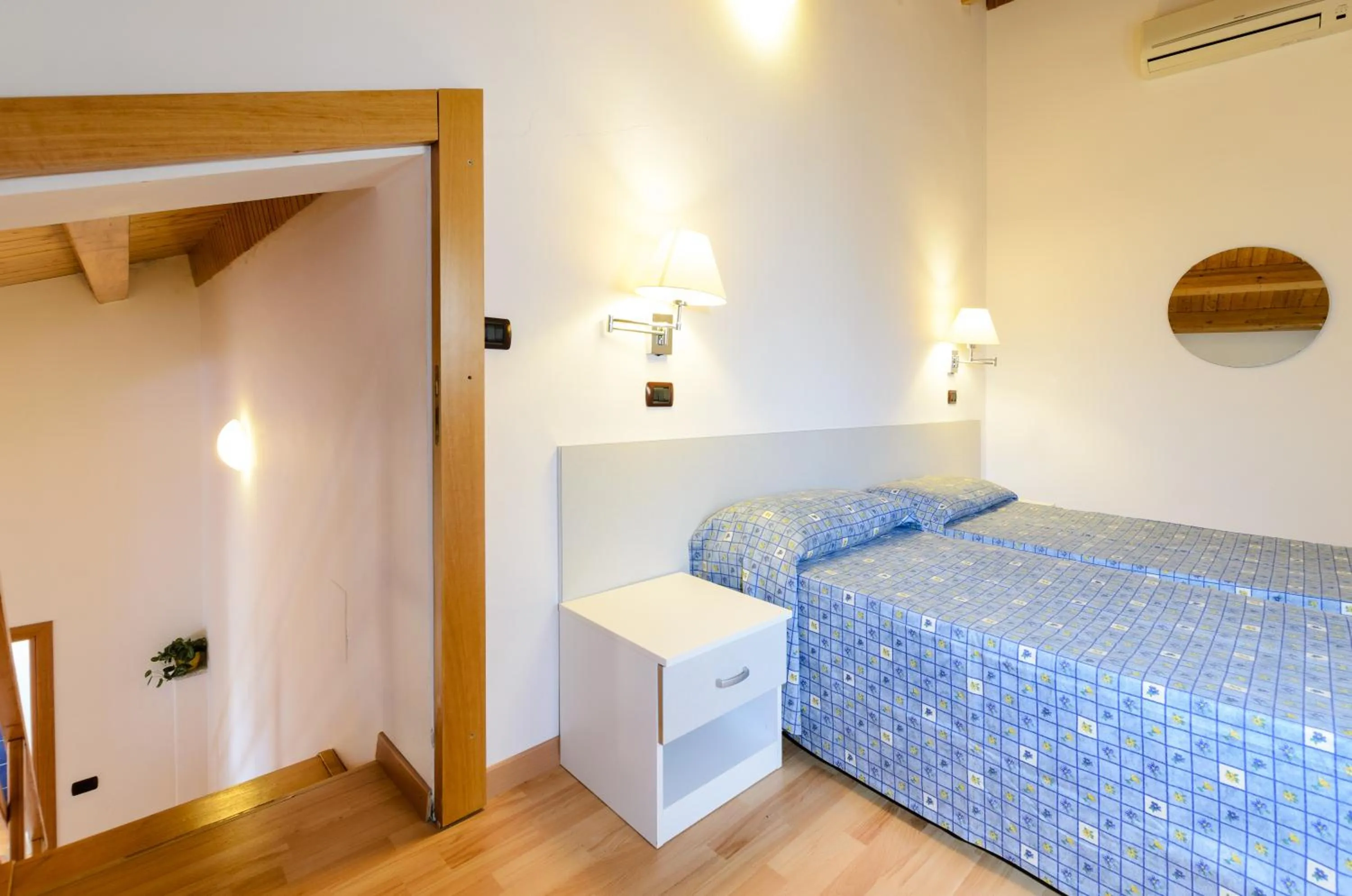 Bed in Le Tartarughe Aparthotel