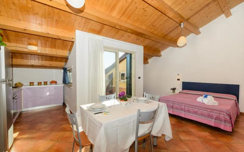 Bed in Le Tartarughe Aparthotel