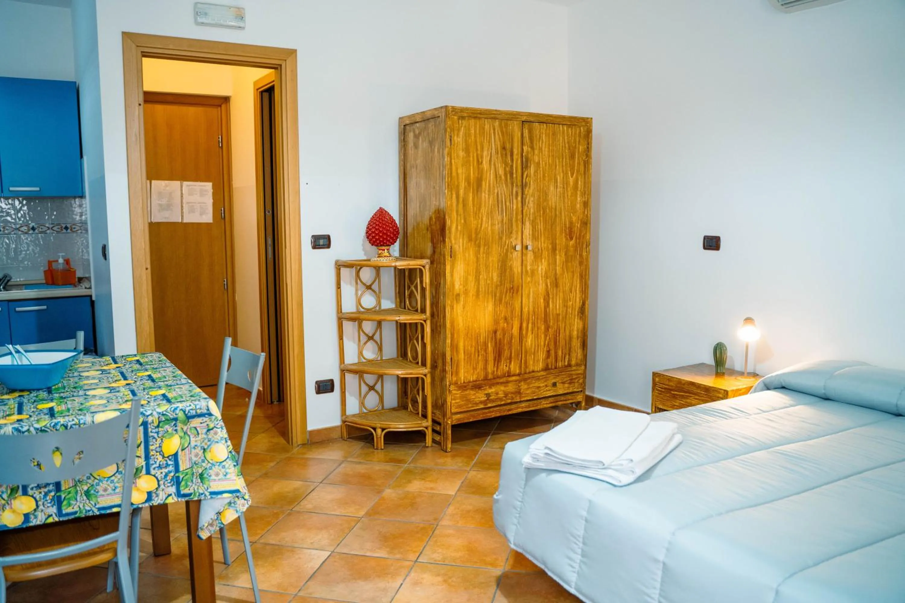 Bed in Le Tartarughe Aparthotel