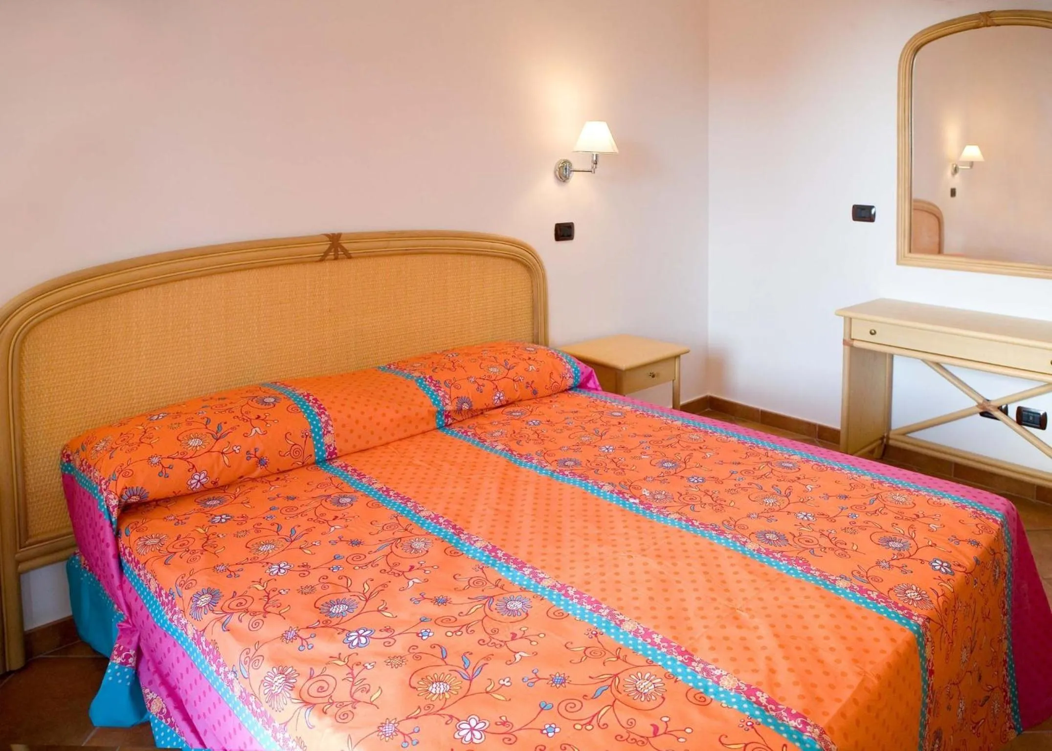 Bedroom in Le Tartarughe Aparthotel