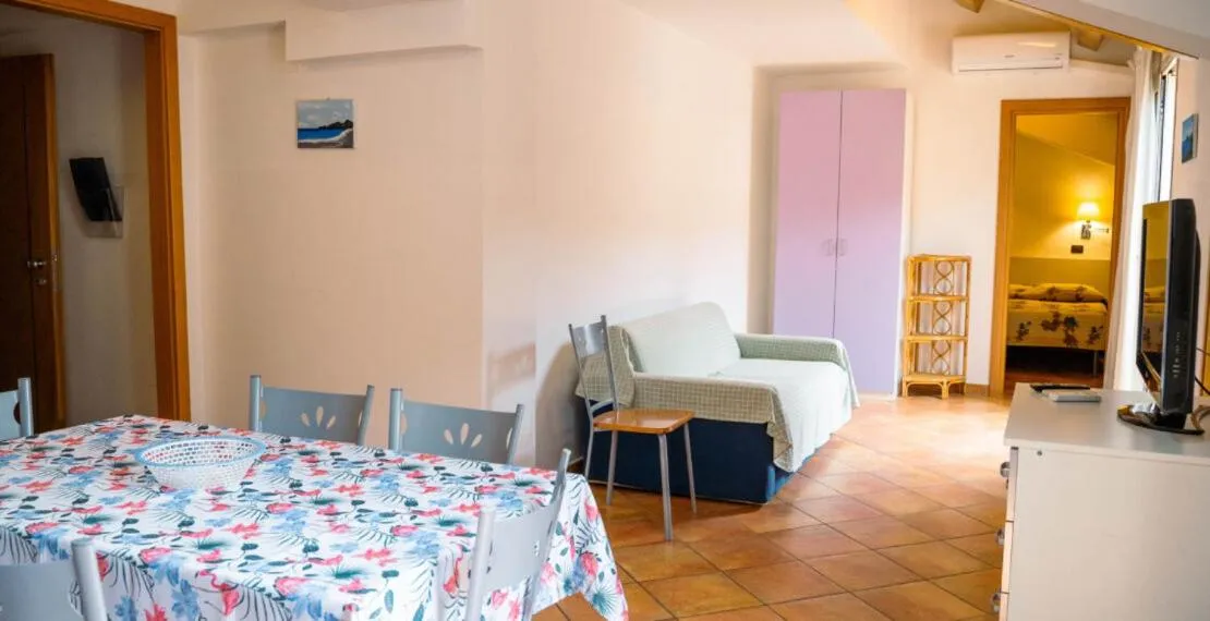 Bed in Le Tartarughe Aparthotel