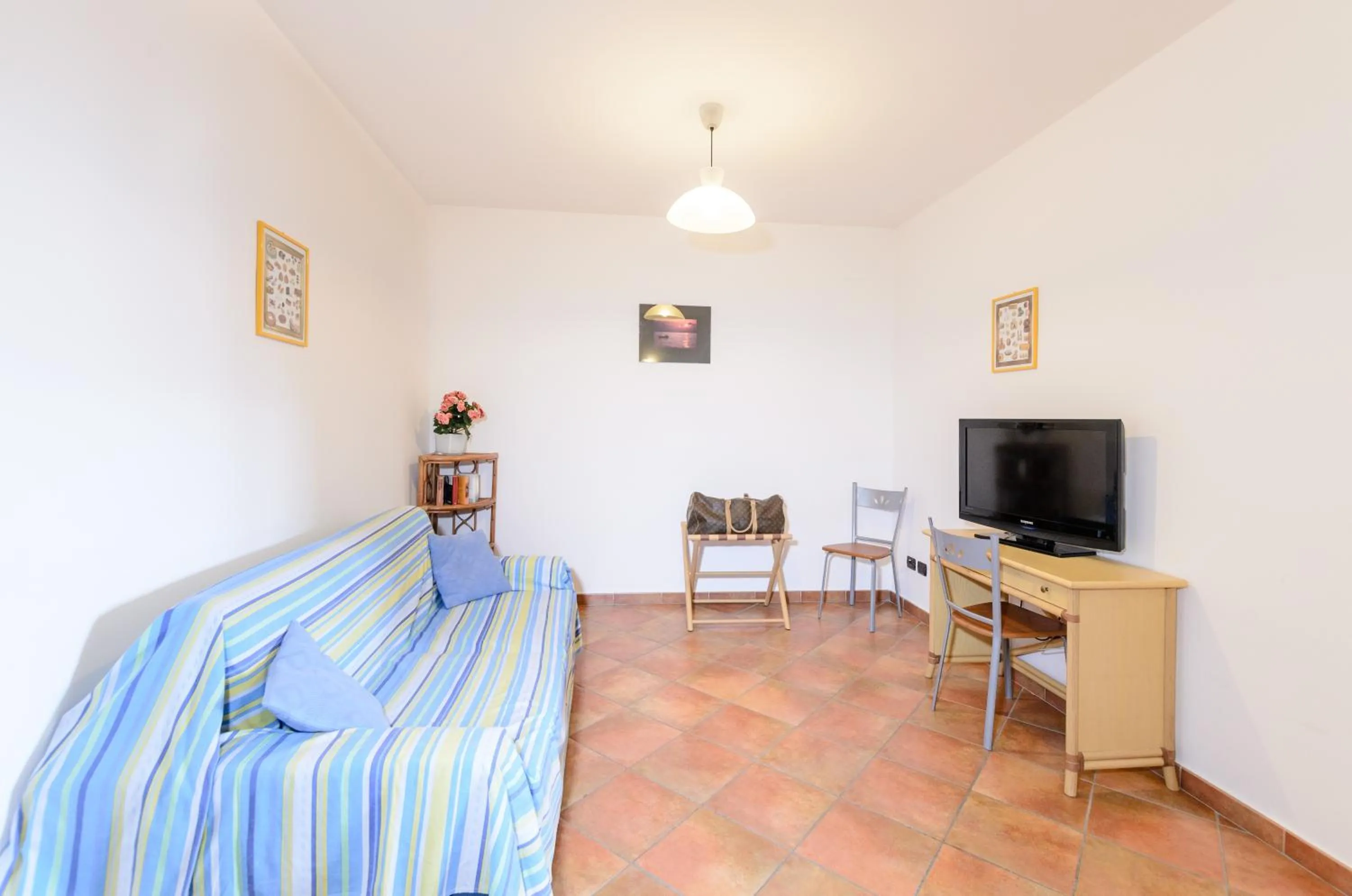 Bed in Le Tartarughe Aparthotel