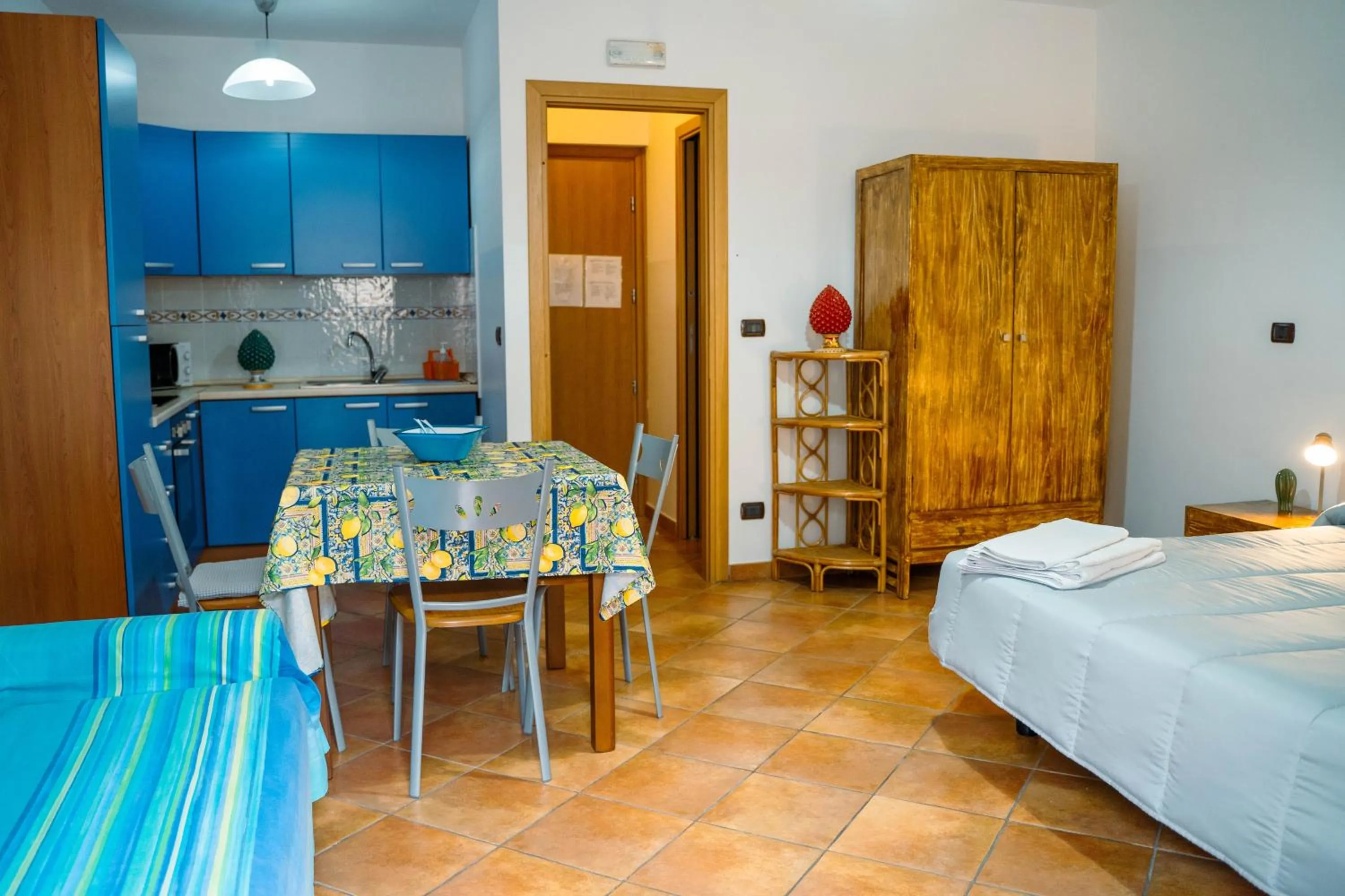 Bed in Le Tartarughe Aparthotel