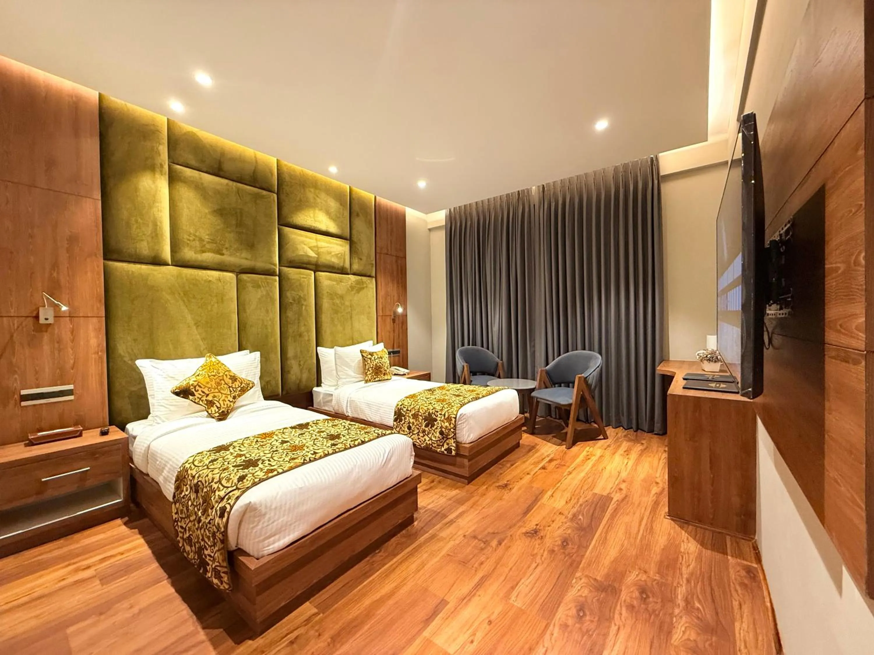 Bed in The Olive Hotel Srinagar