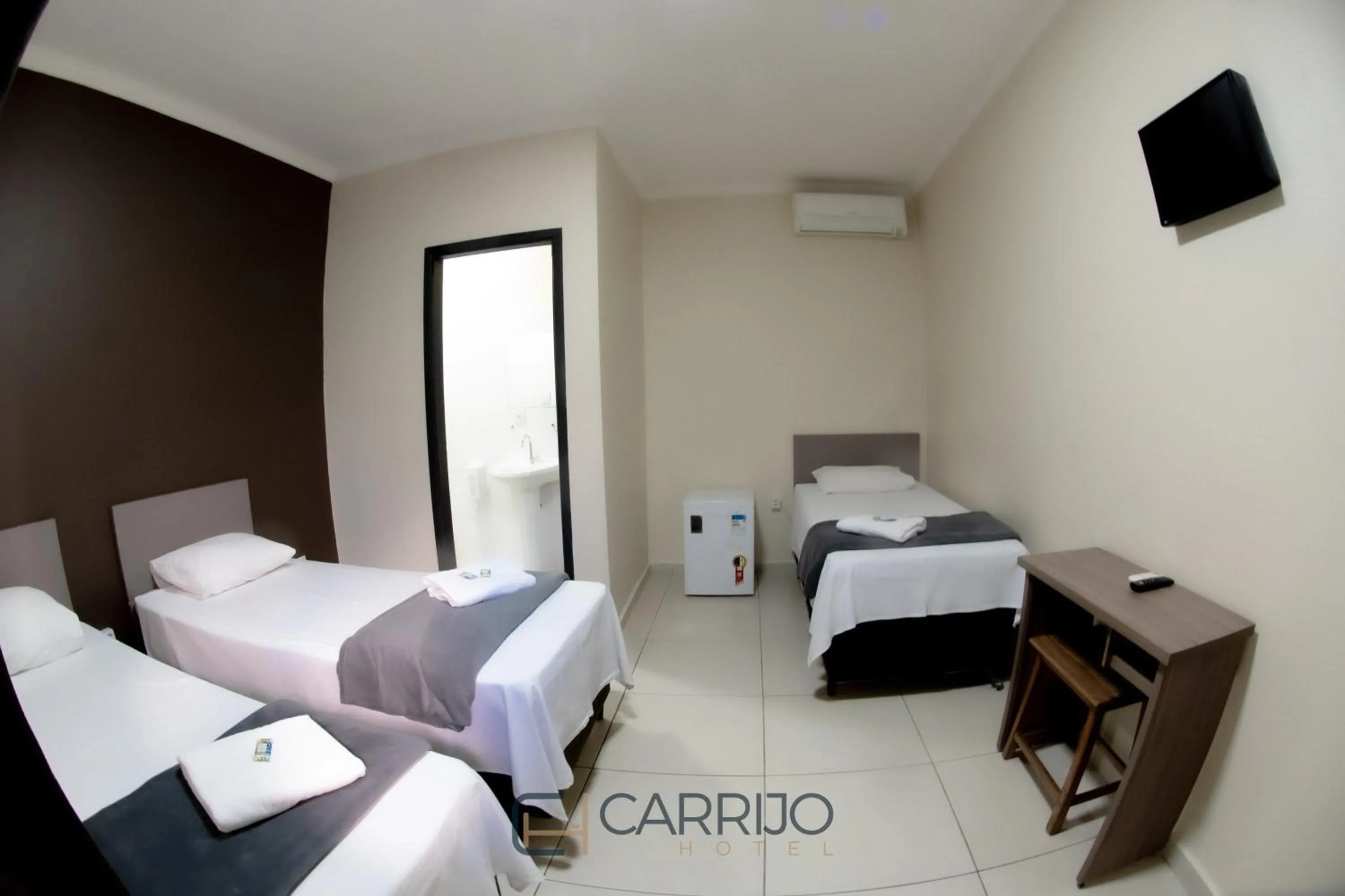 Basic Triple Room - single occupancy in Carrijo Hotel
