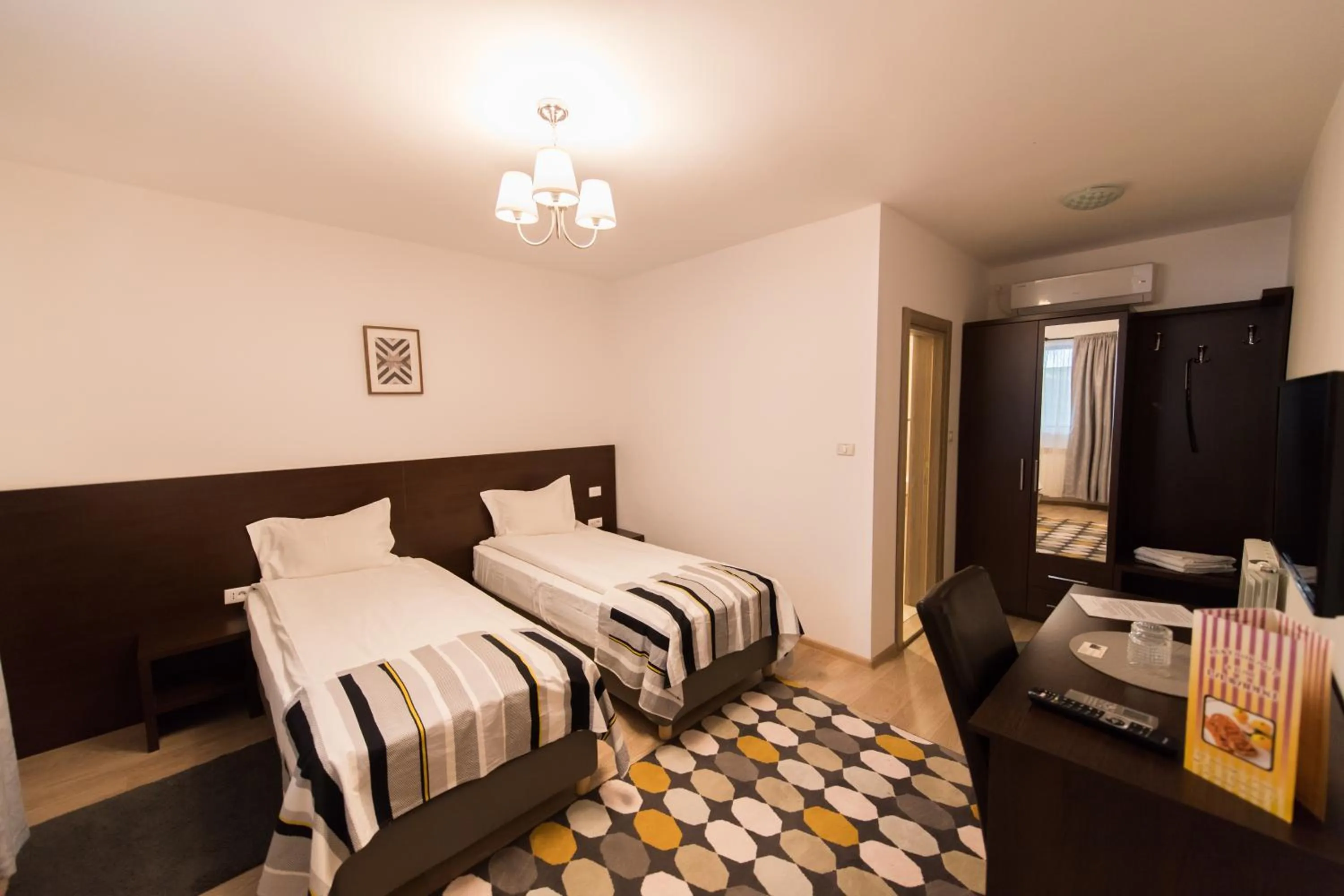 Bed in Pensiunea Puiu