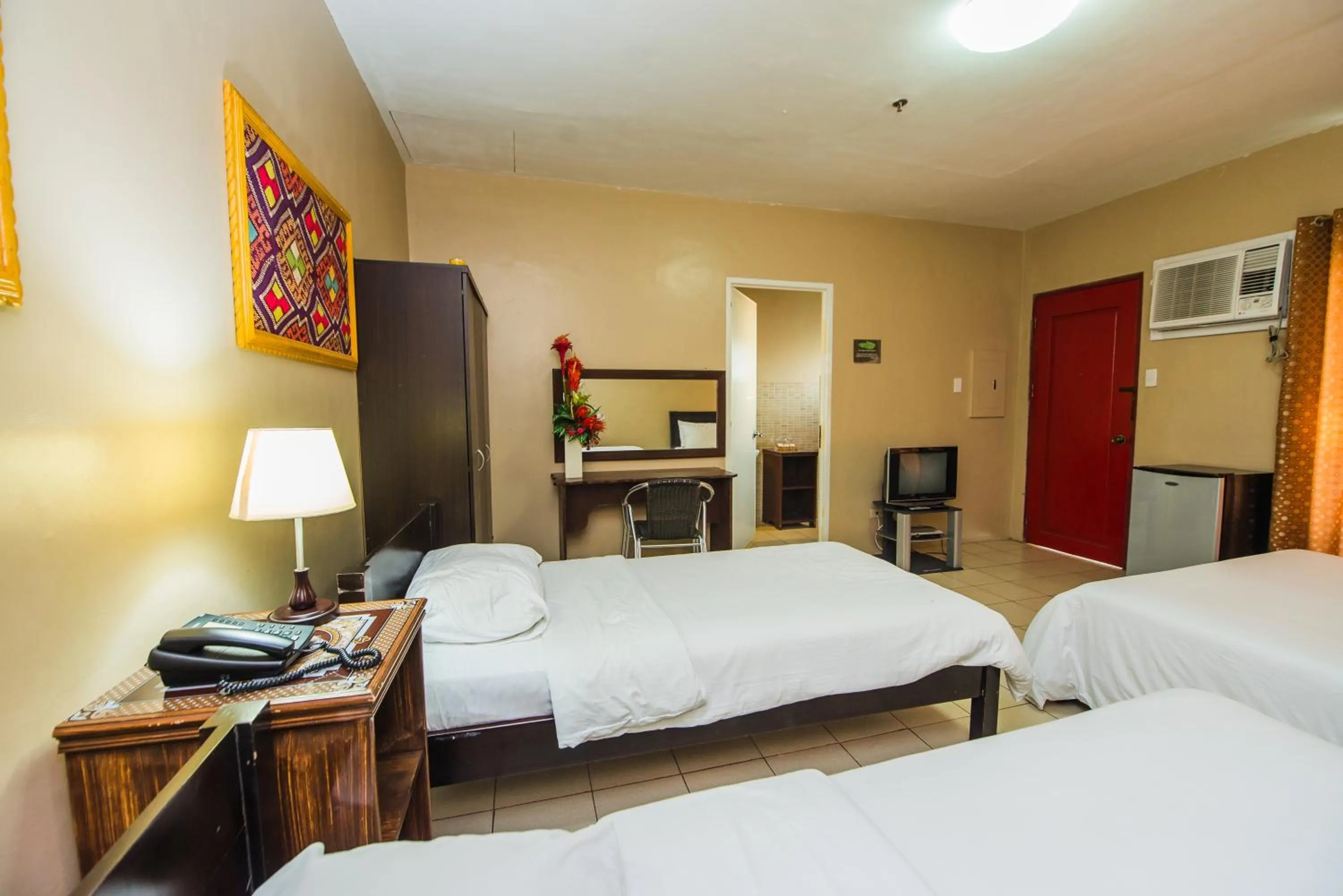 Bed in Northland Resort Hotel Manapla