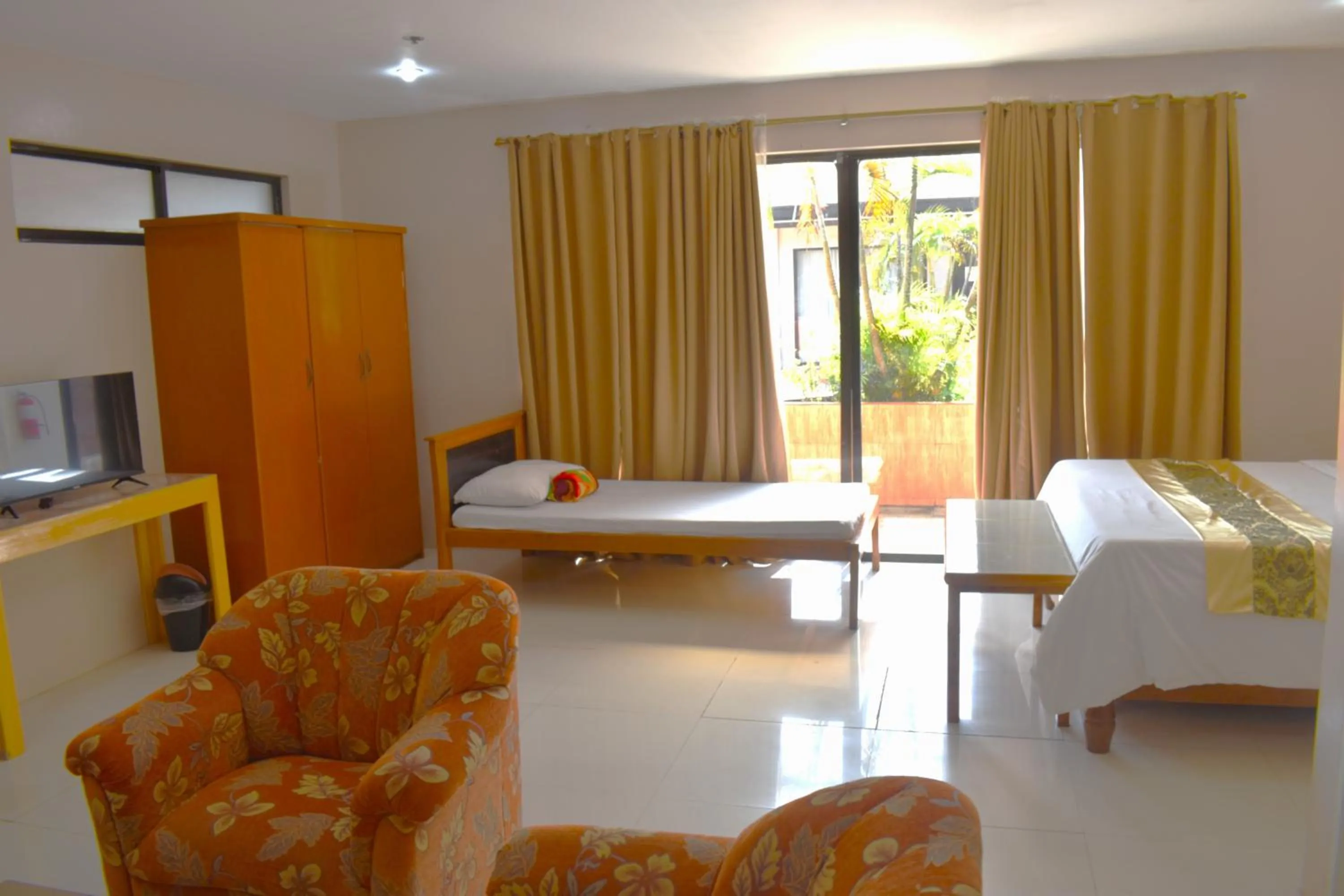 Bed in Northland Resort Hotel Manapla