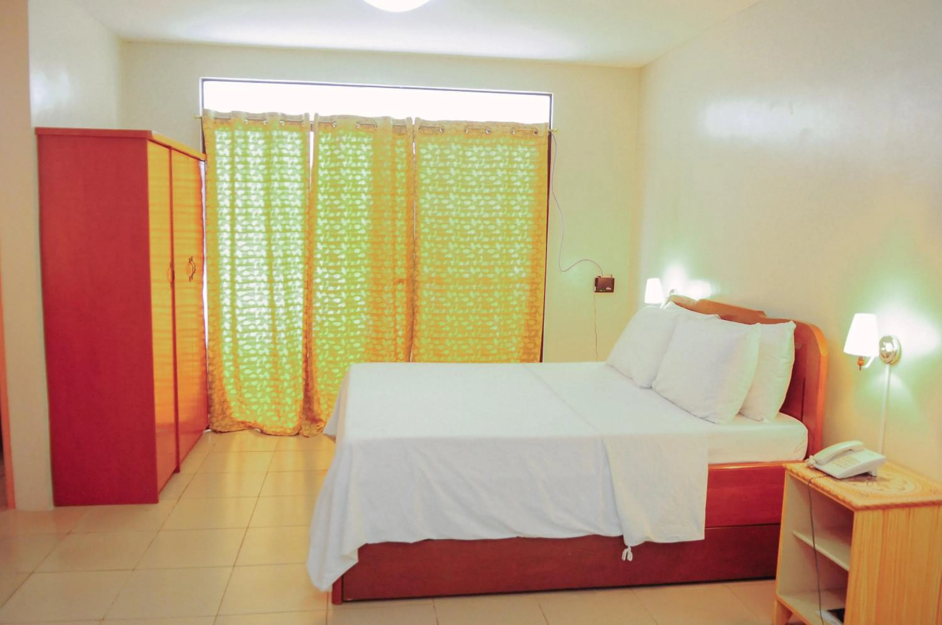 Bed in Northland Resort Hotel Manapla