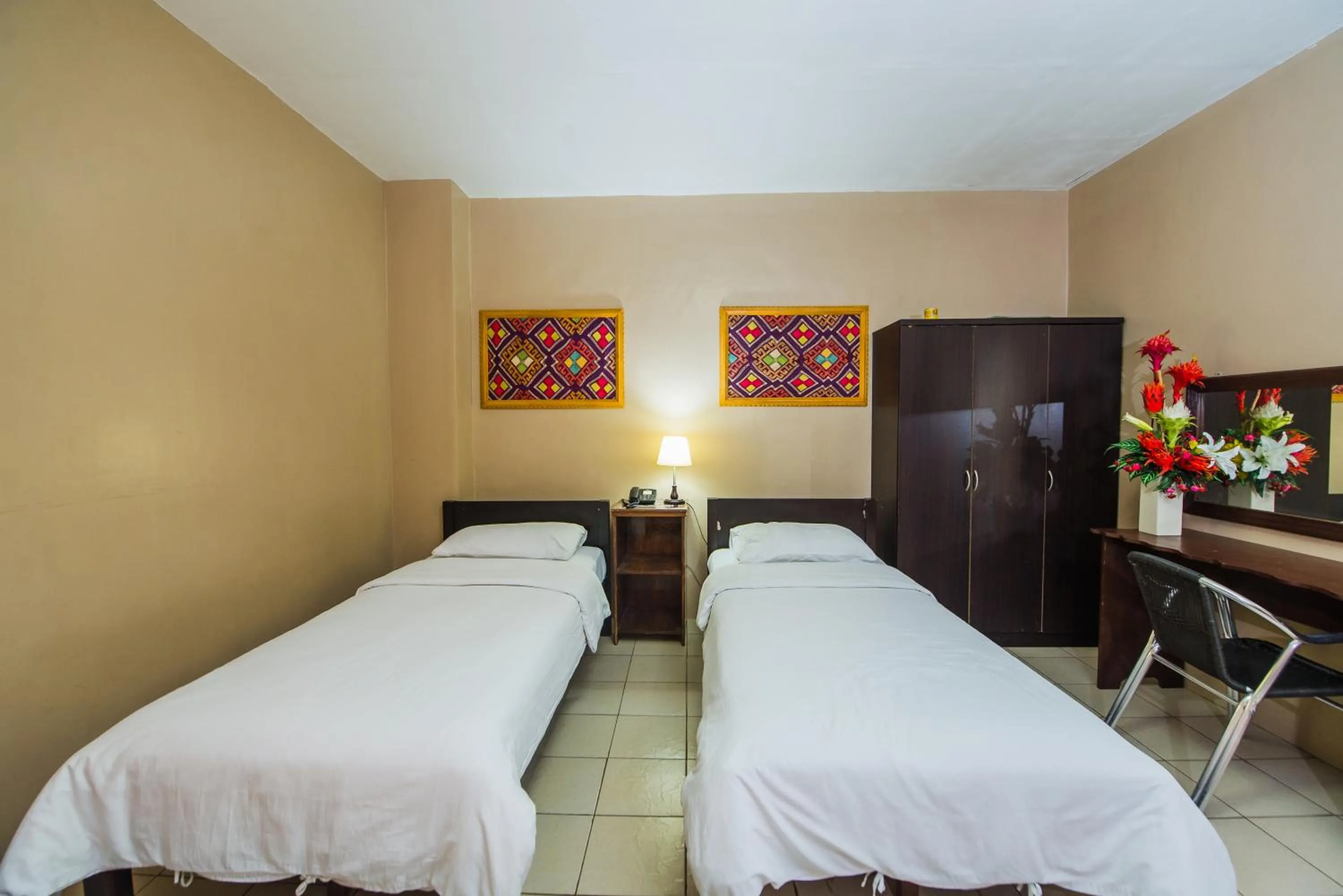 Bed in Northland Resort Hotel Manapla