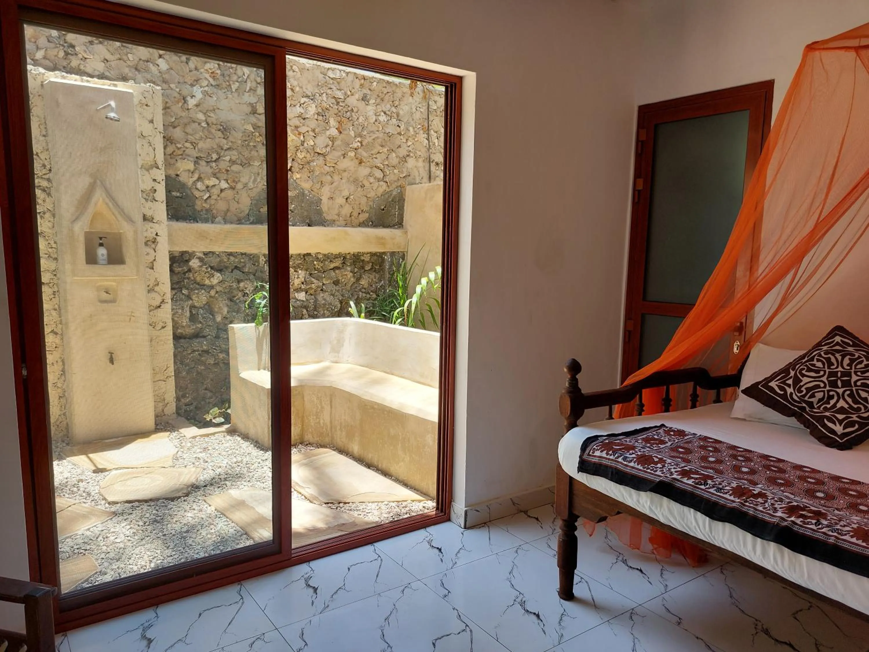 Balcony/Terrace, Bed in Villa Bahati Zanzibar