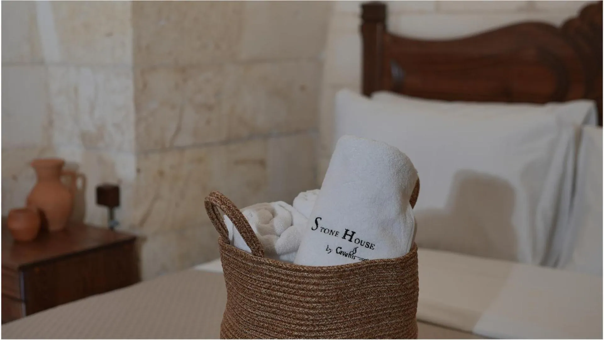 towels, Bed in Stone House by Cevahir
