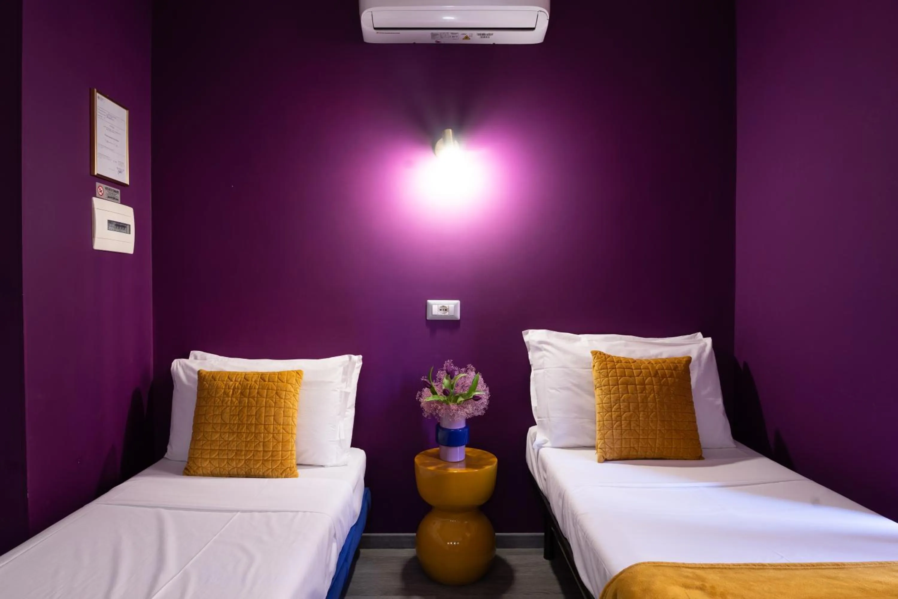 Bed in C'est La Vie Suites