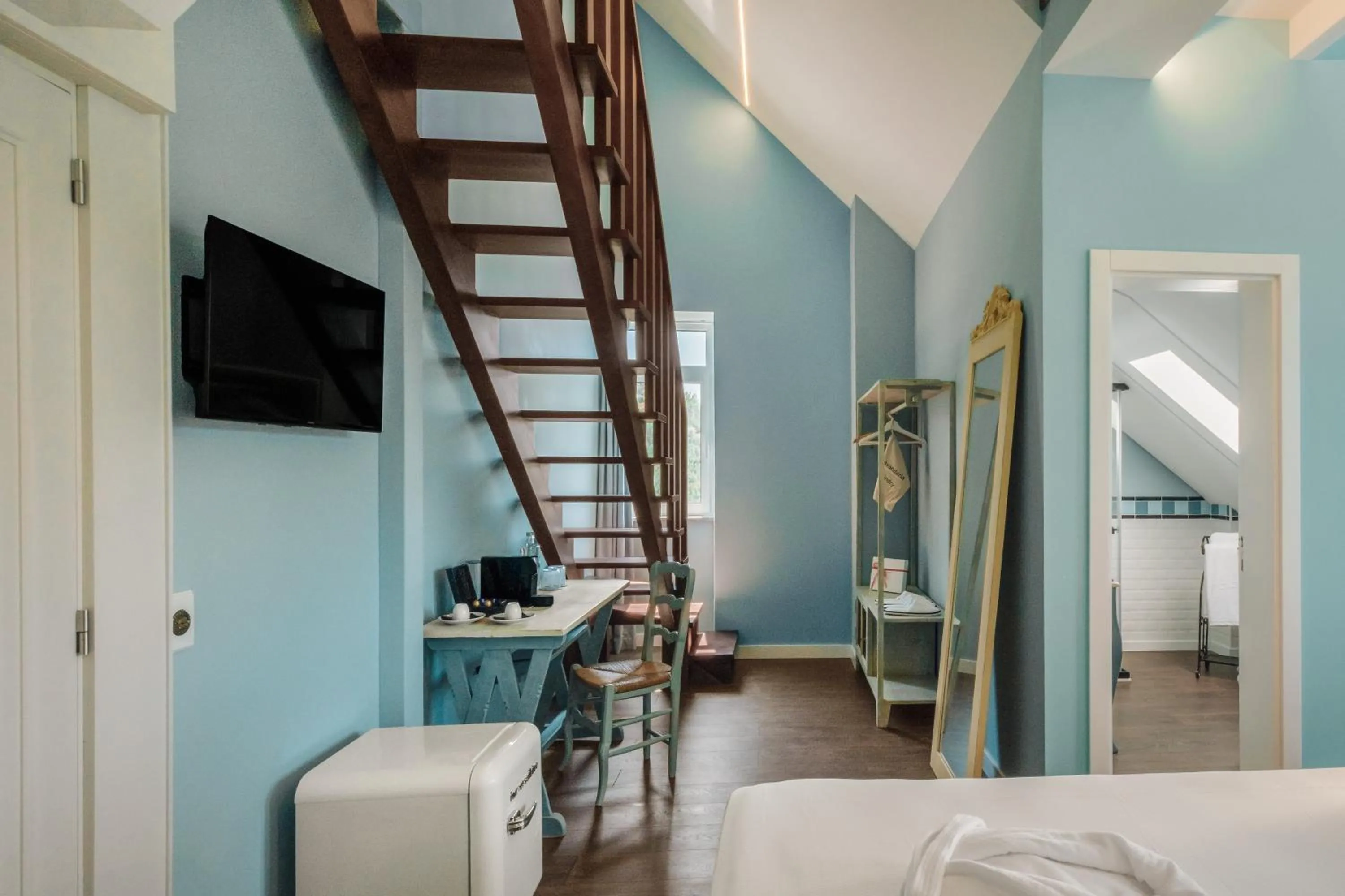 Communal lounge/ TV room, Bed in Palacete do Guerreiro Charme Hotel & SPA