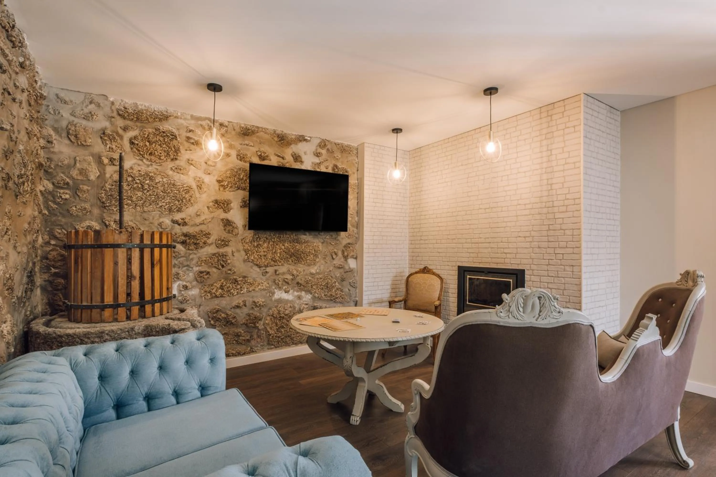 Communal lounge/ TV room in Palacete do Guerreiro Charme Hotel & SPA
