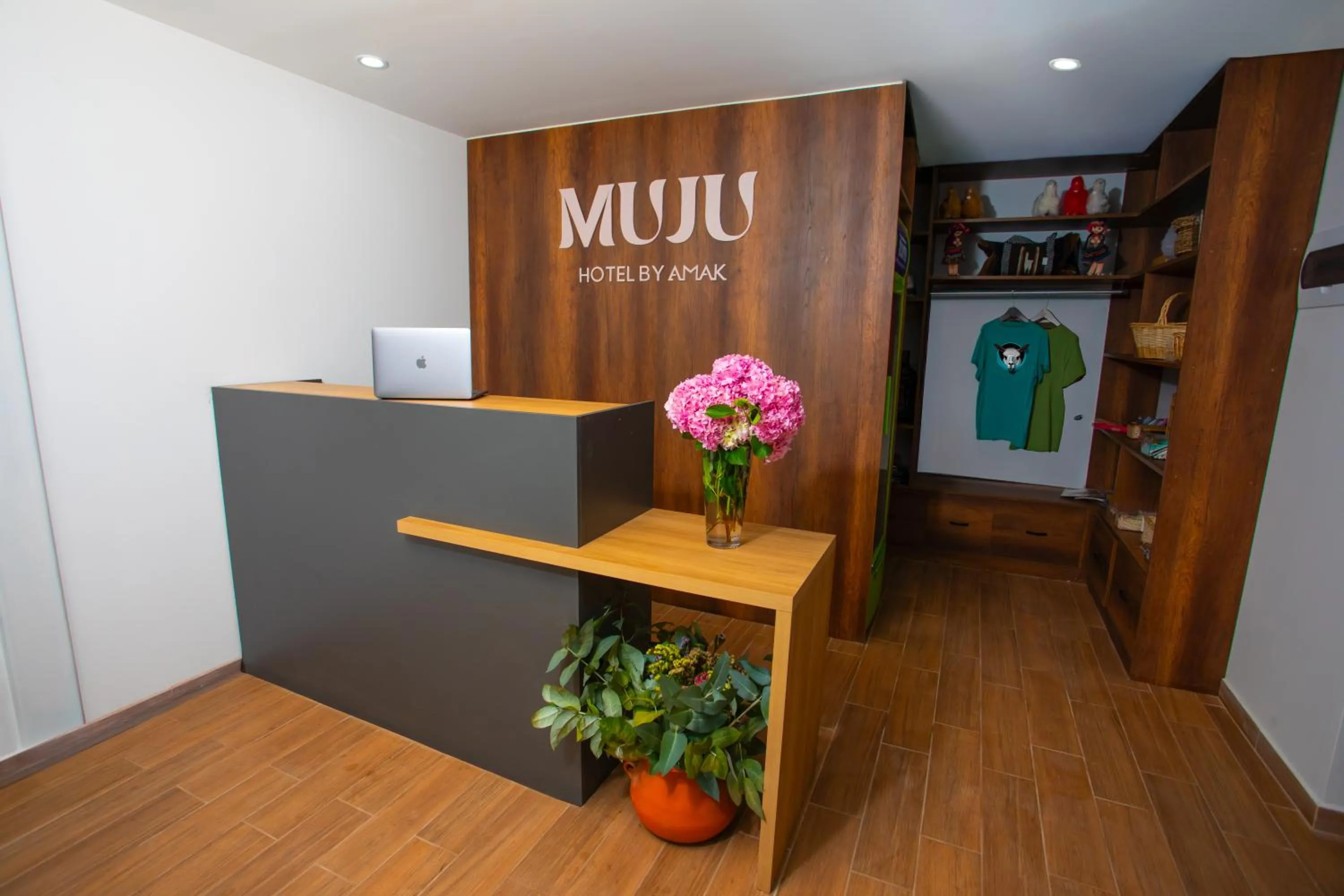 Property logo or sign in MUJU hotel by Ämak