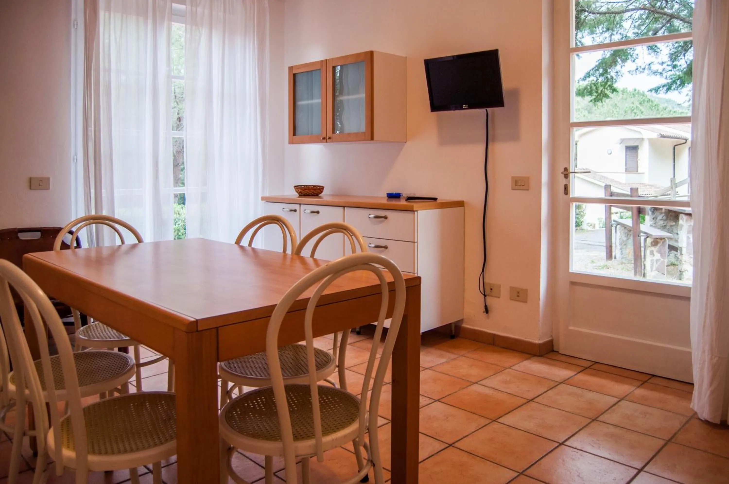 Dining area in Residence Le Mimose