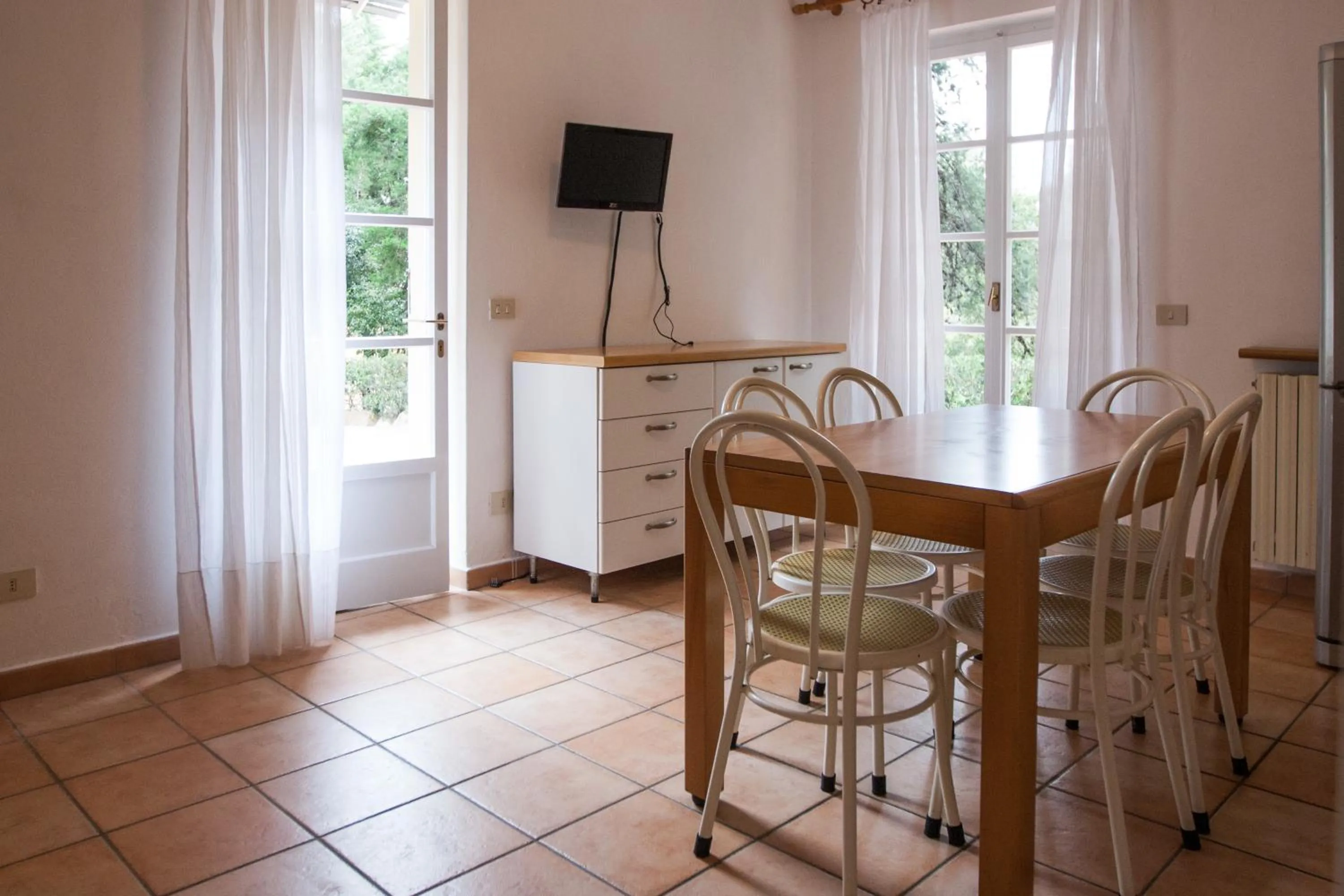 Dining area in Residence Le Mimose